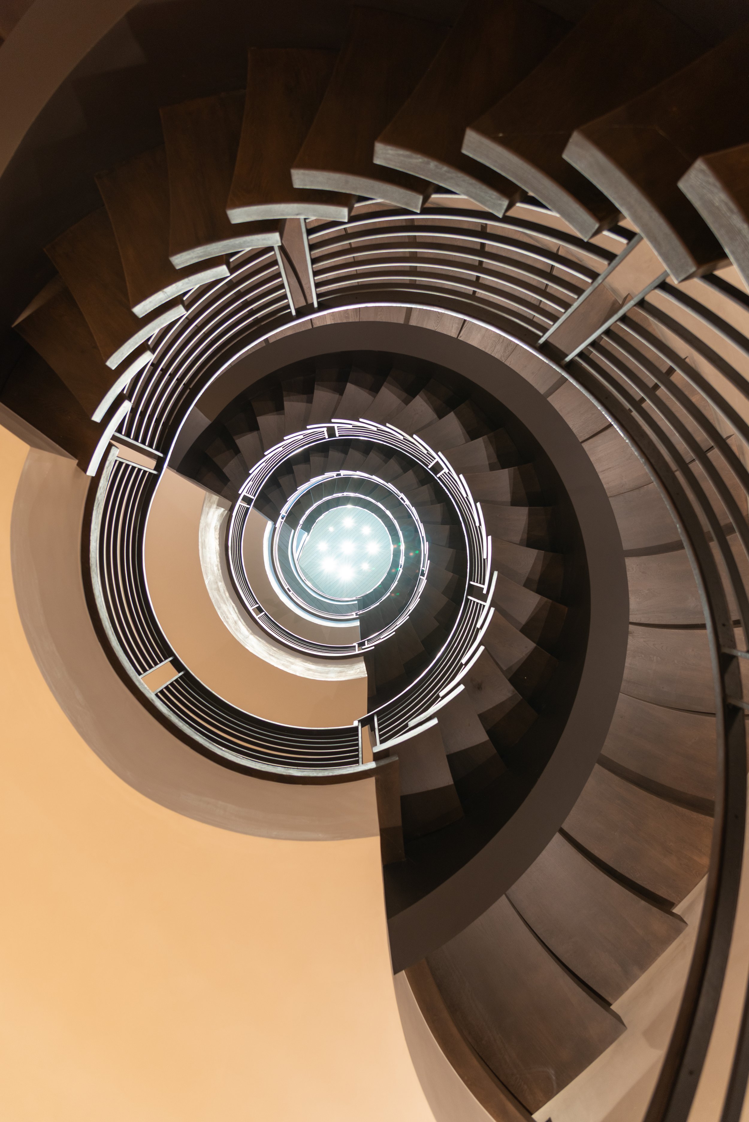 View up five flight stair case