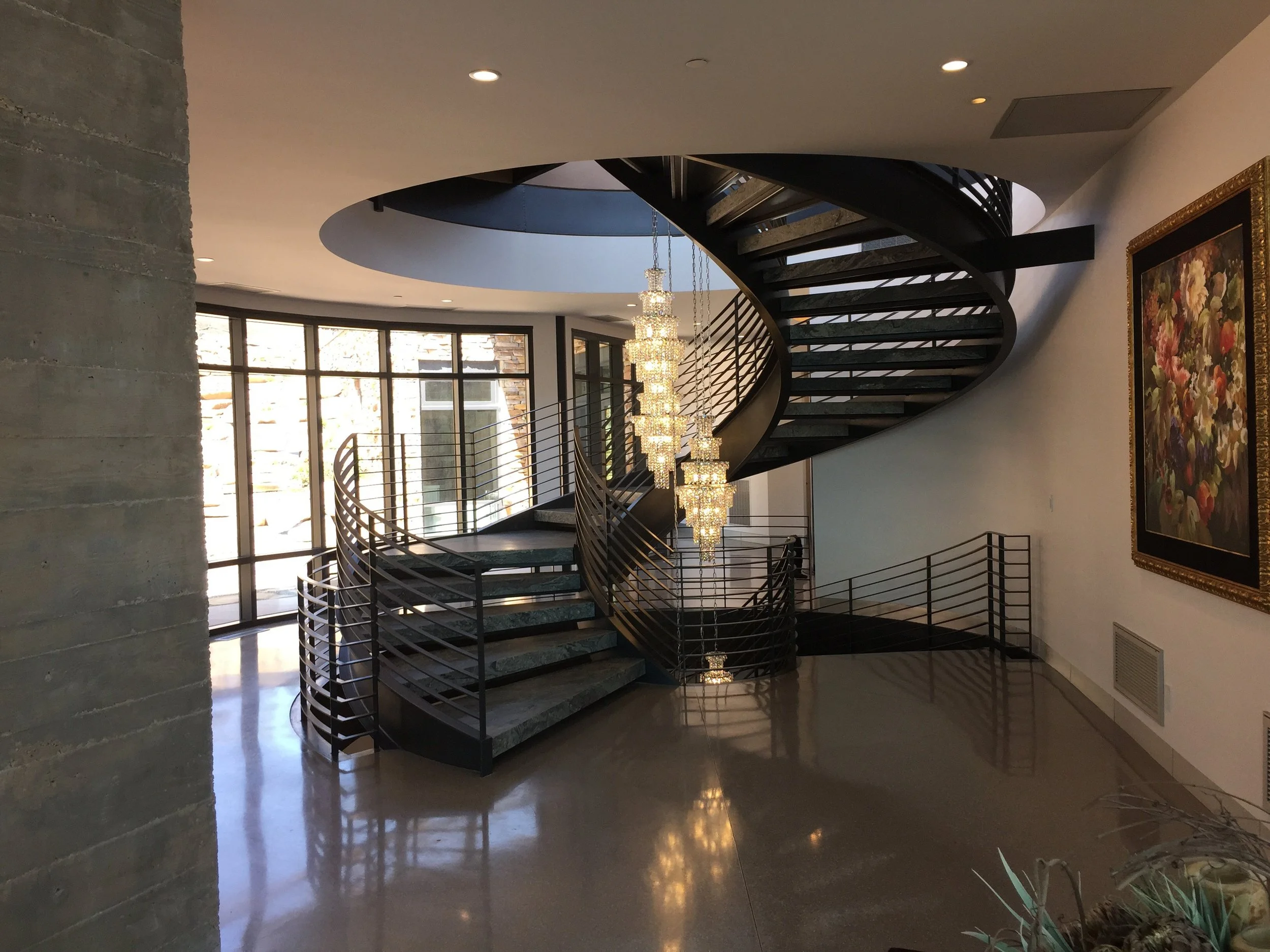 Multi level stair and railings in custom hillside residence ...