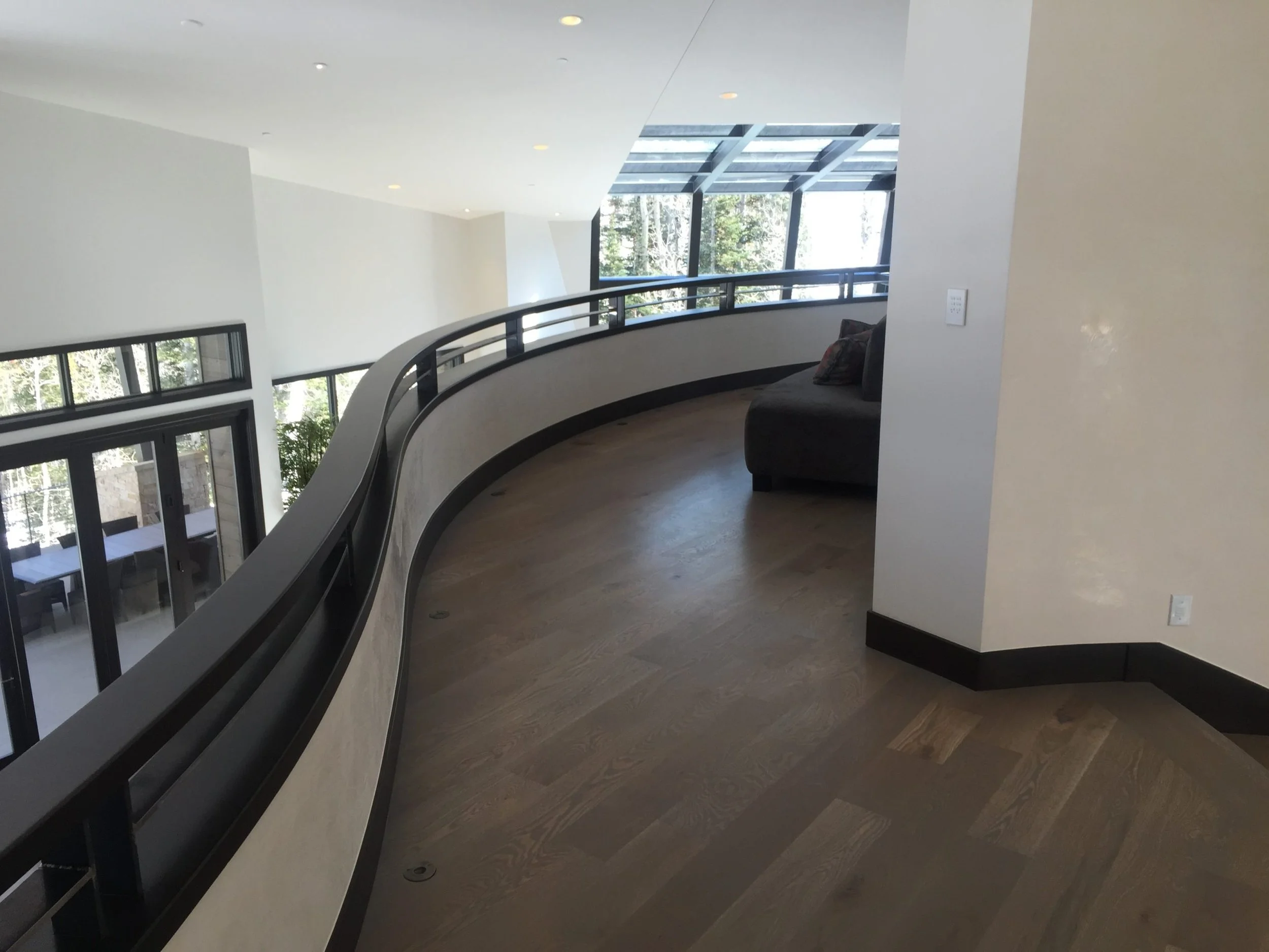 Heavy custom rolled flowing handrail