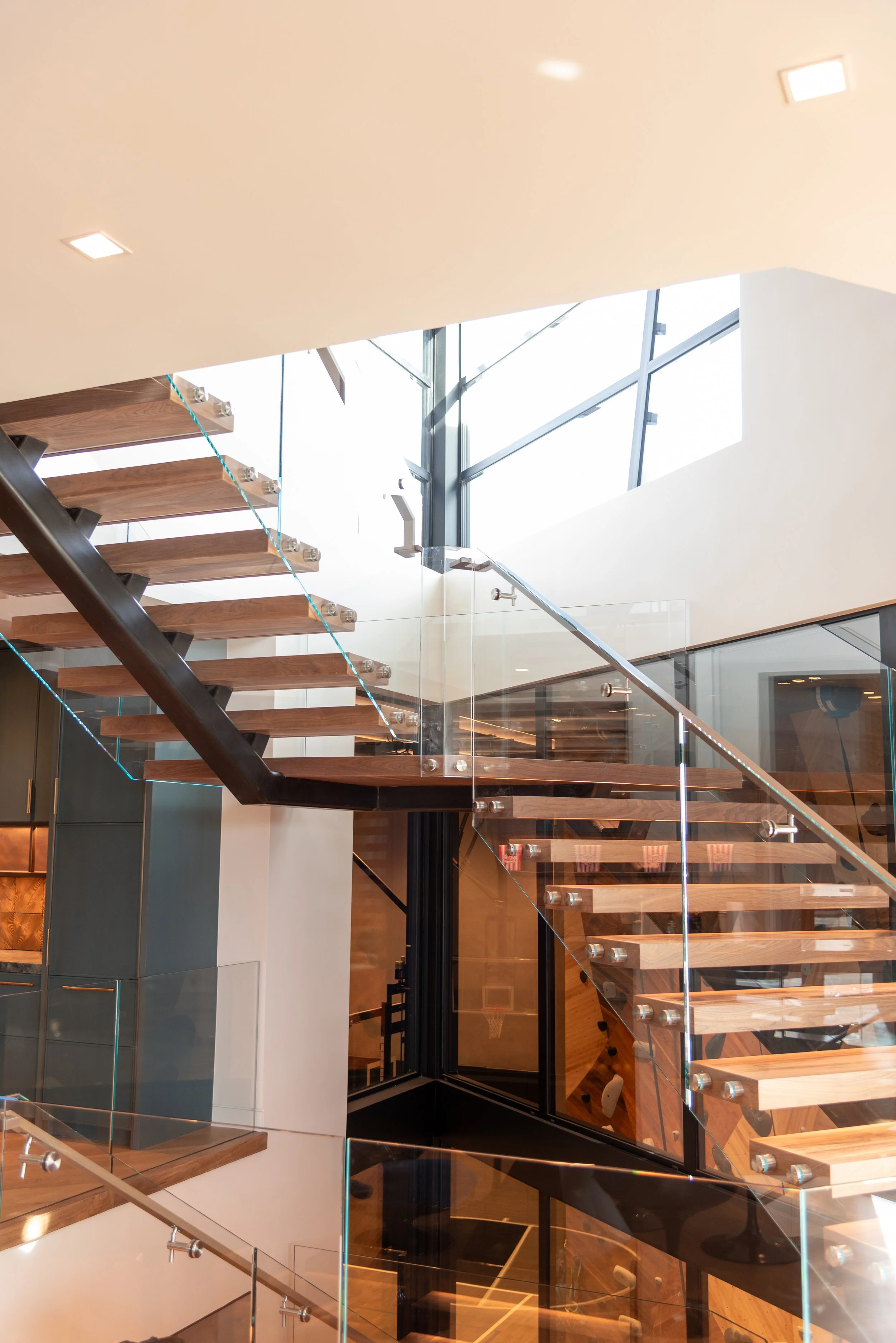 Custom stair transition to lower levels