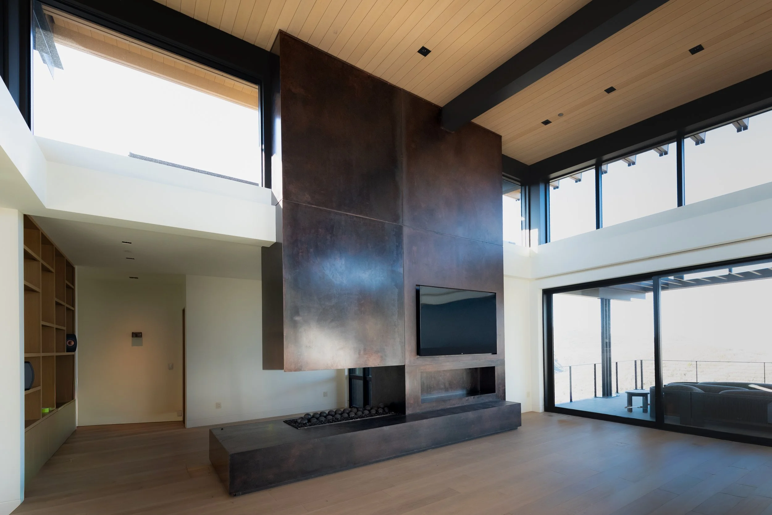 Custom steel clad fireplace angled shot