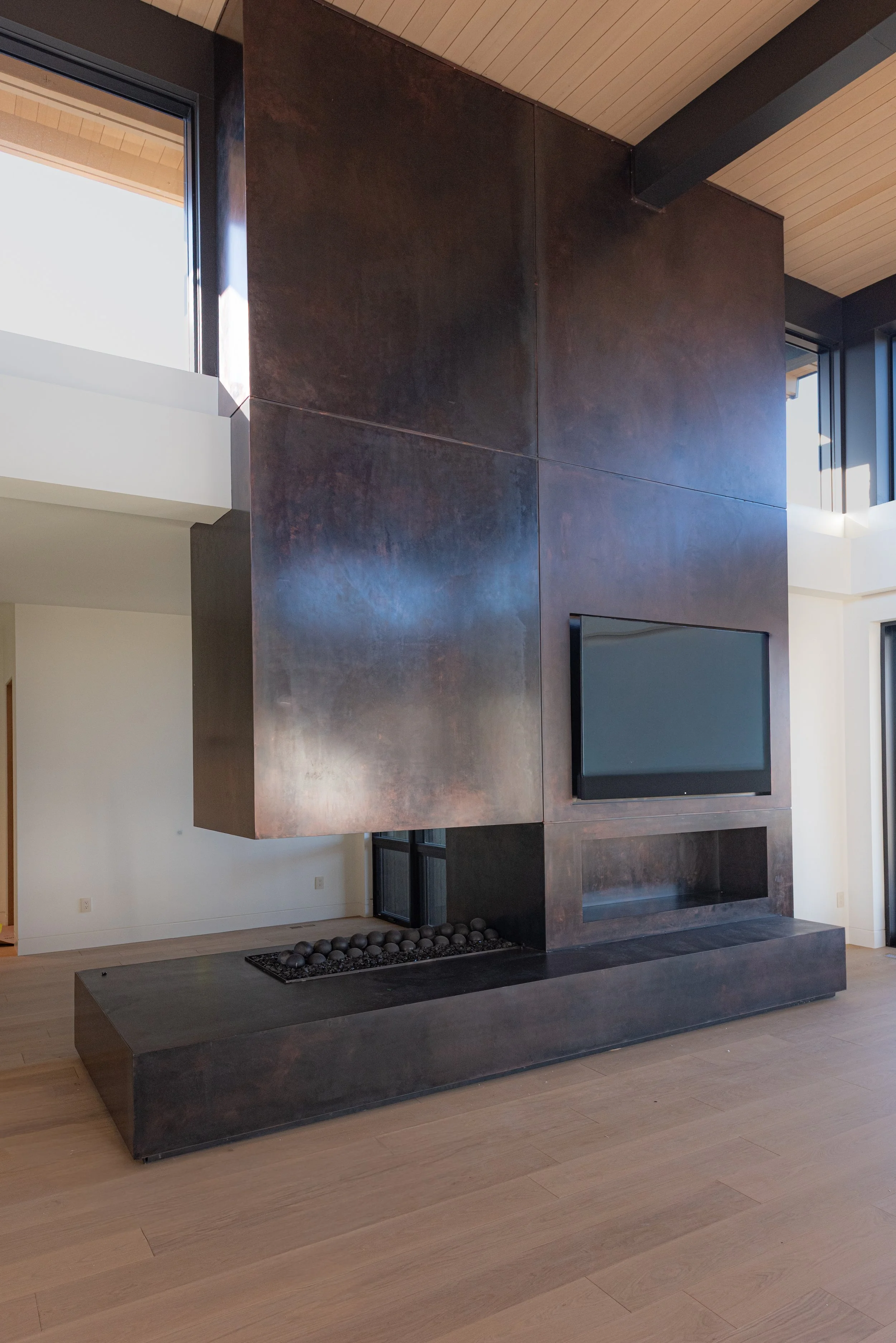 Steel clad custom fireplace