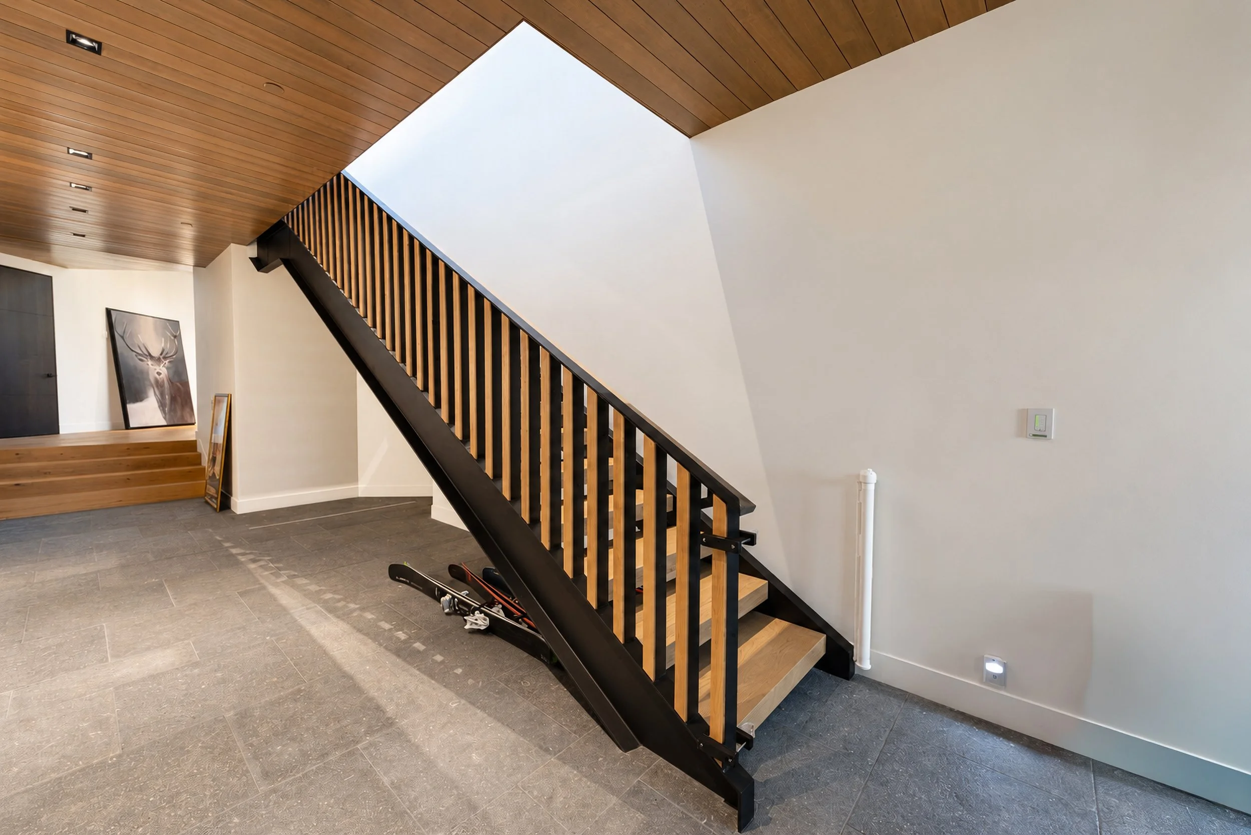 Handrail flowing down stair