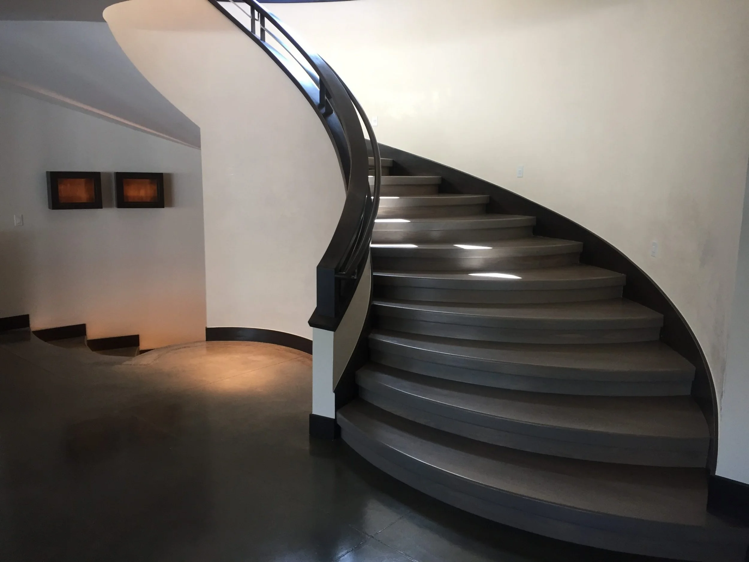 Sweeping staircase lower level