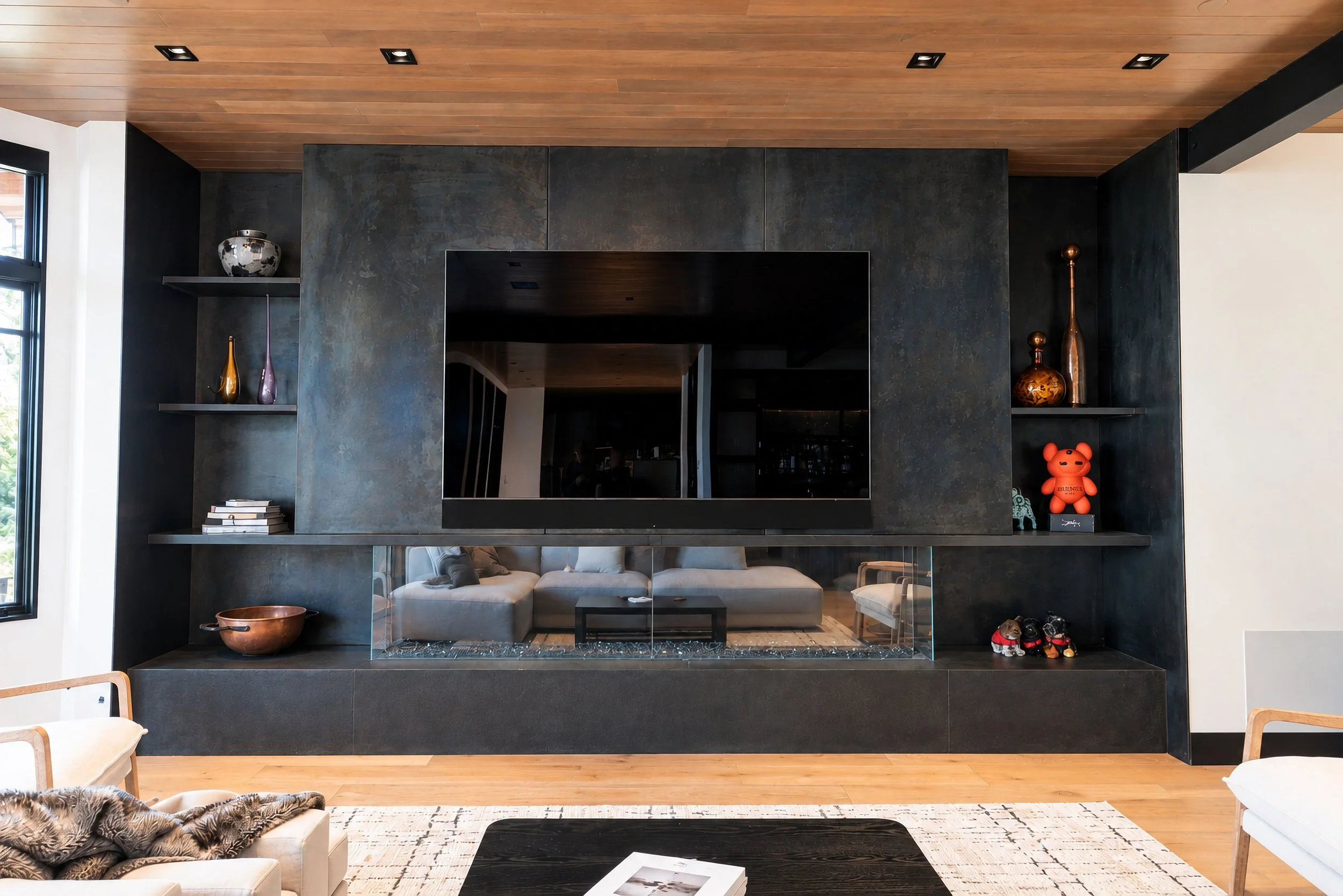 Steel clad fireplace and shelving