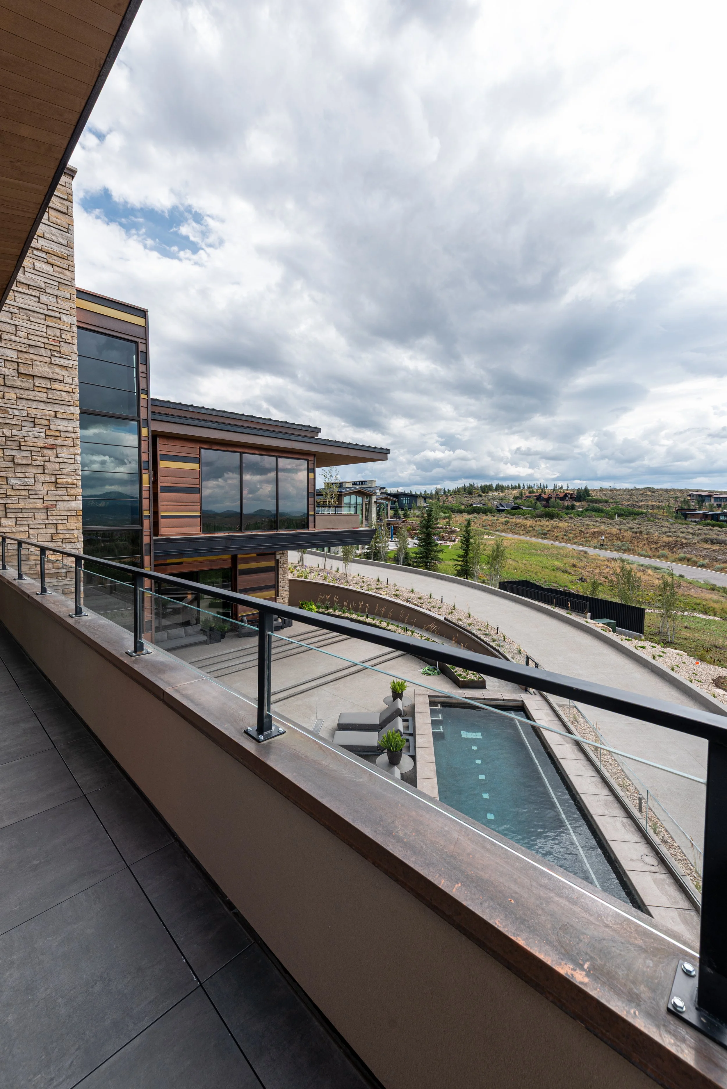 Steel half rail overlooking pool