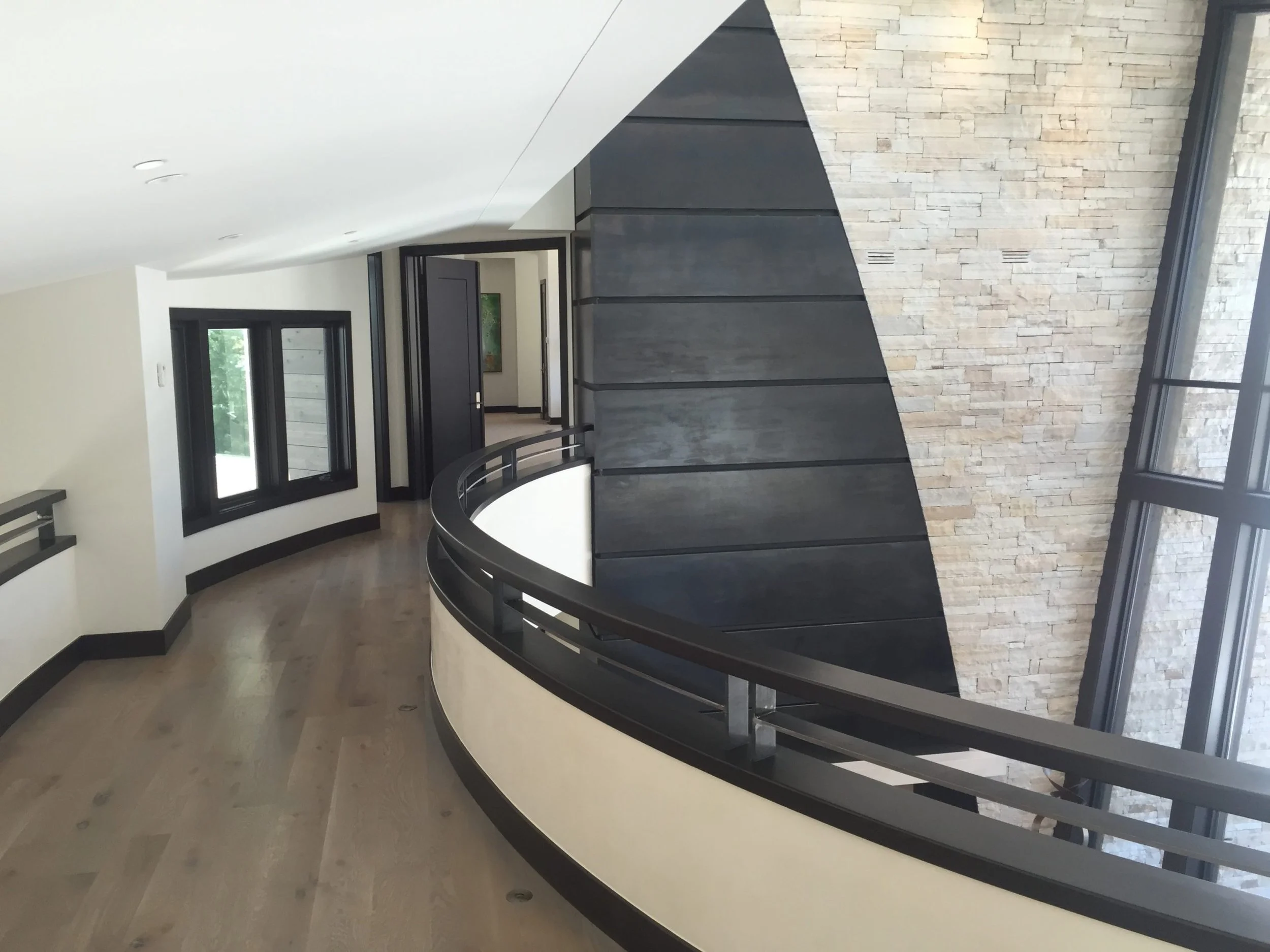 Top of steel fireplace cladding with patina