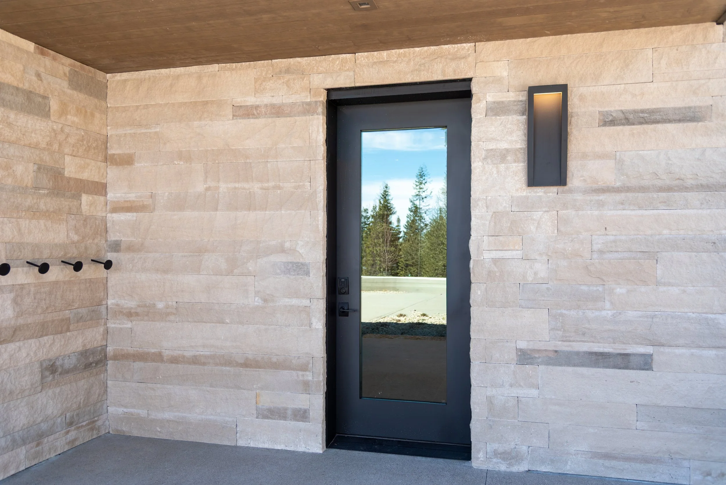 Steel Clad Door Next to Ski Rack