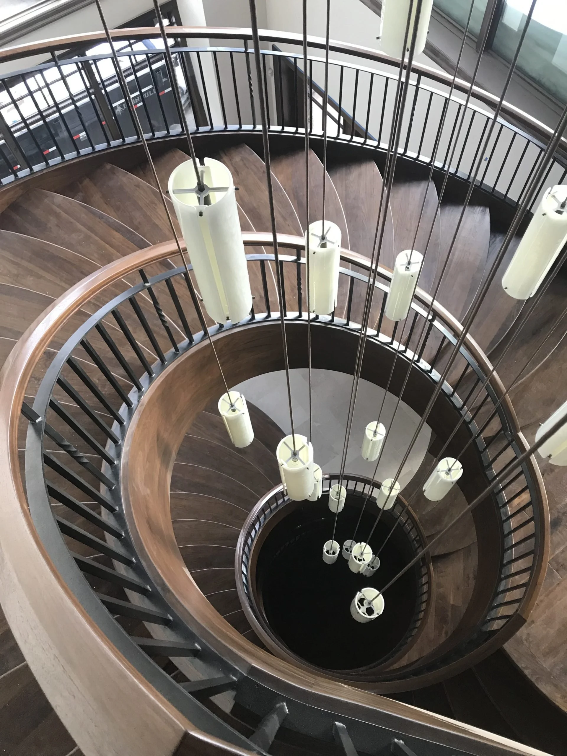 Custom curved stair with classic hand rail