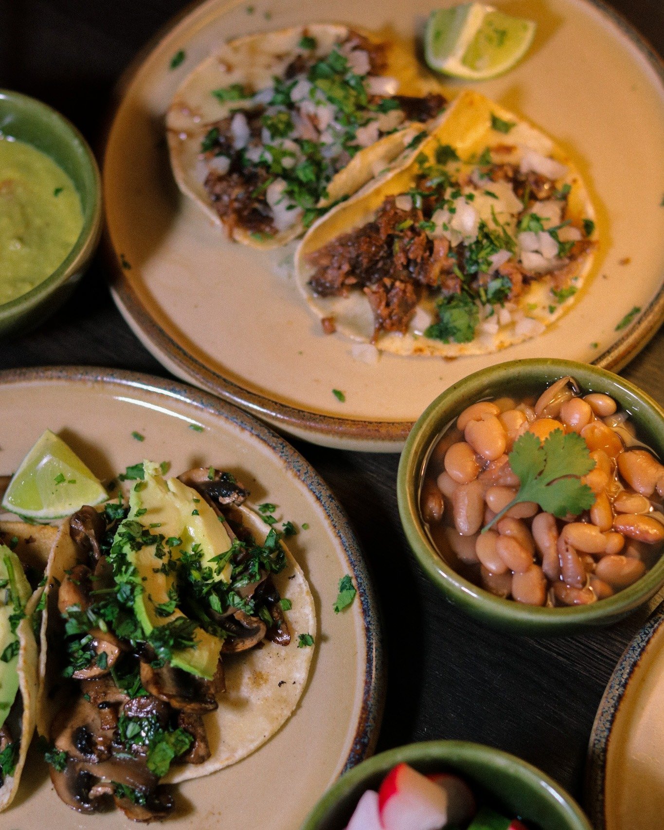 A proper table isn&rsquo;t built around one plate.

Tacos in the middle. Beans on the side. Salsas, lime, guacamole, everything meant to be shared, mixed, and passed around. No one eats the same bite twice.

That&rsquo;s how it works. You sit down, a