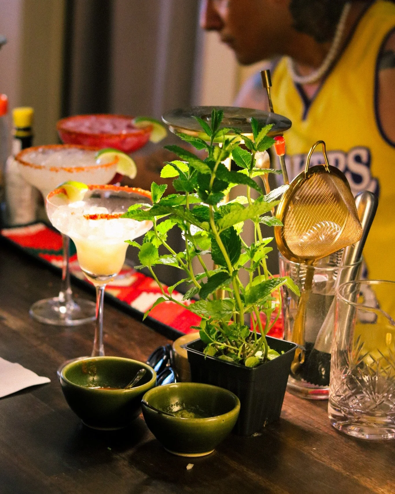 Mint, picked off the plant. Not pulled from a jar.
That's the kind of detail most bars skip. Not here.
Every cocktail at Pantitl&aacute;n starts the same way &mdash; fresh herbs grown right next to the bar, real fruit, salts we mix in-house, syrups w