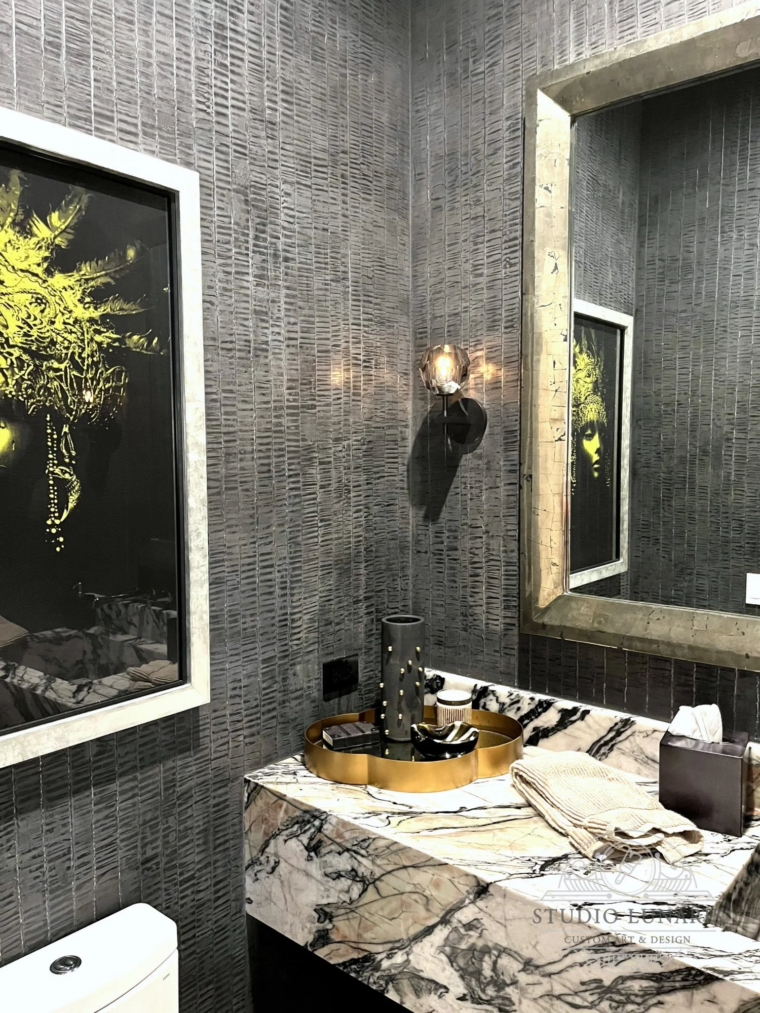 Powder room plaster texture with striated pattern and silver metallic accents