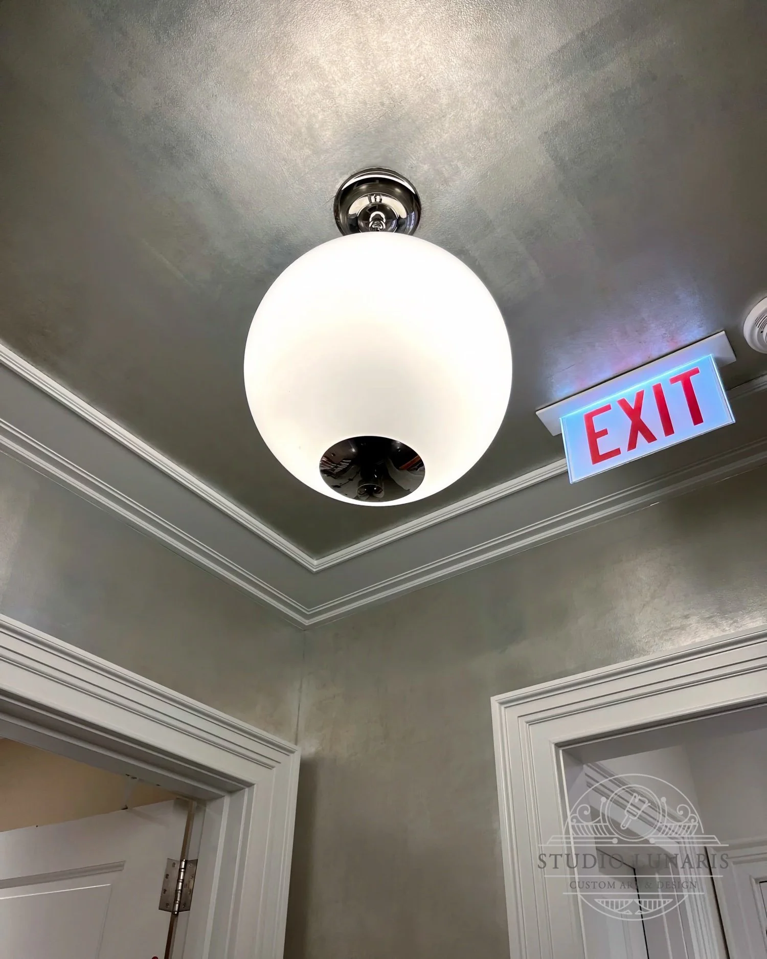 Elevator lobby silver patina ceiling and walls