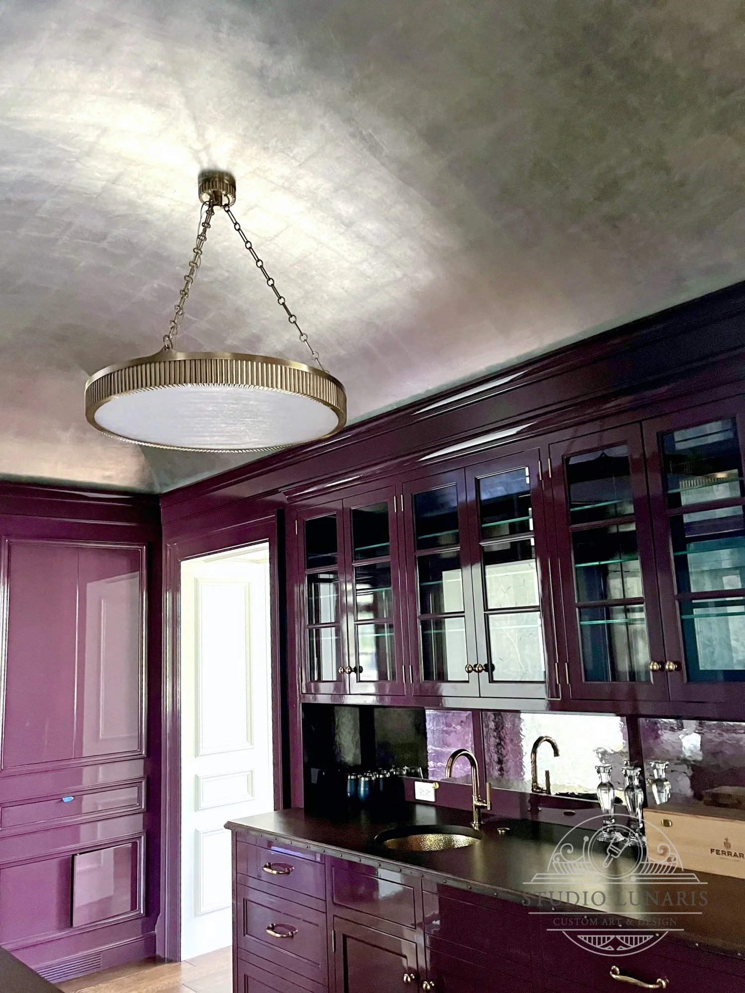 Vaulted silver leaf patina ceiling in a butler's pantry