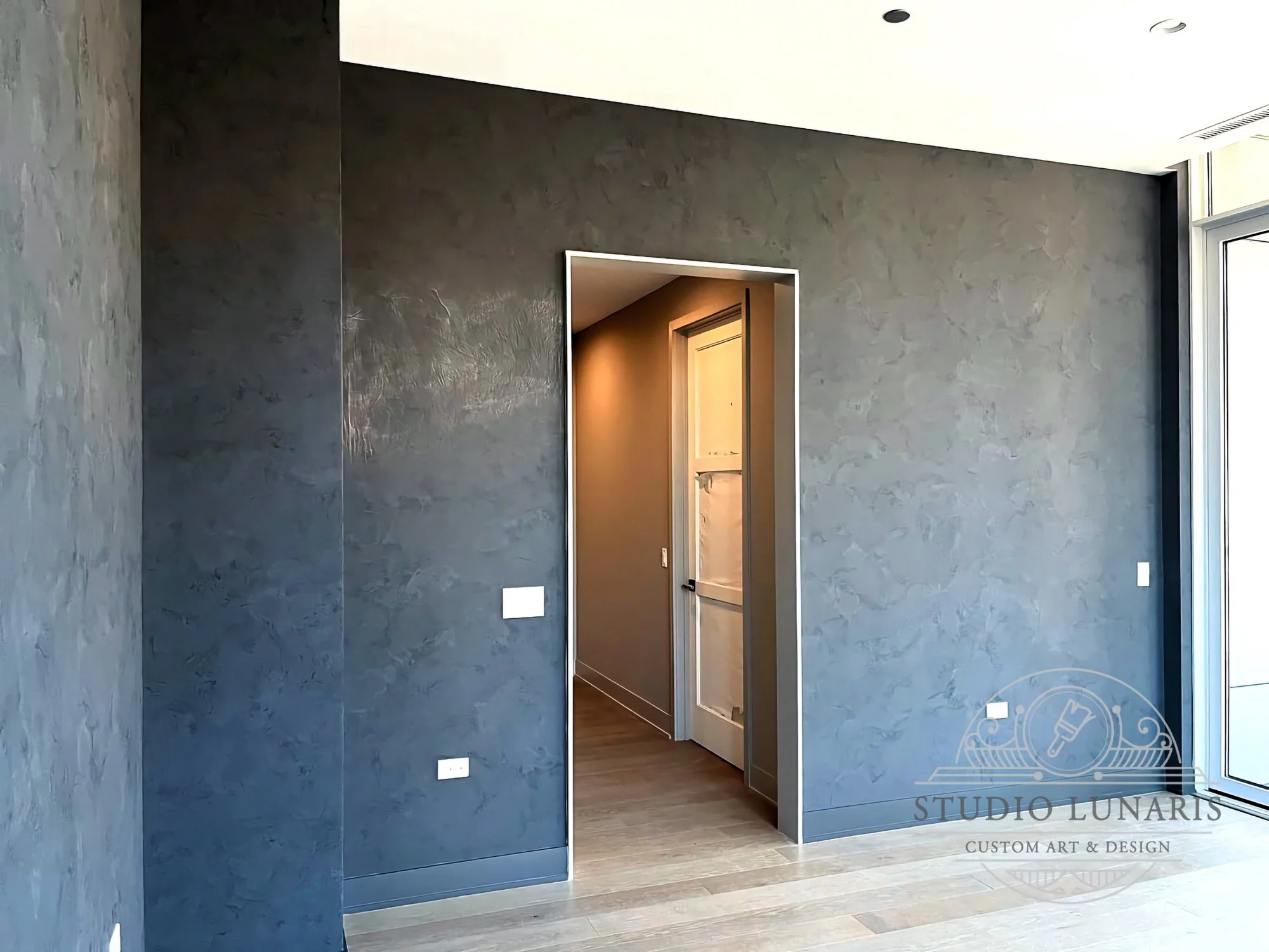 Bedroom Venetian plaster walls in a charcoal color