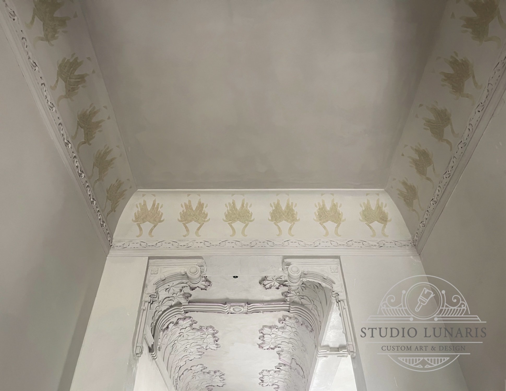 Hallway cove ornamental stencil design on a soft, warm grey marmorino background