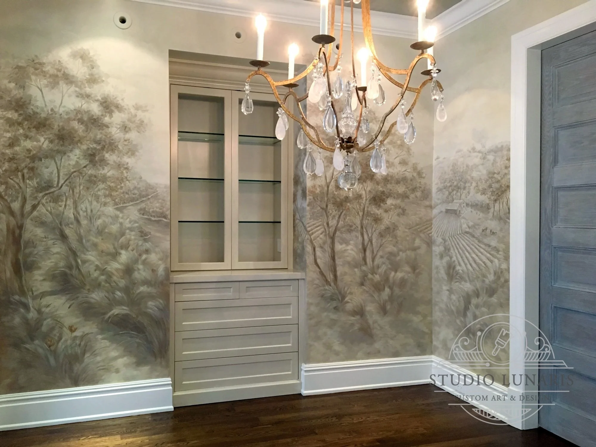 Scenic dining room mural with a sepia toned, grisaille color palette and a countryside/beach theme.