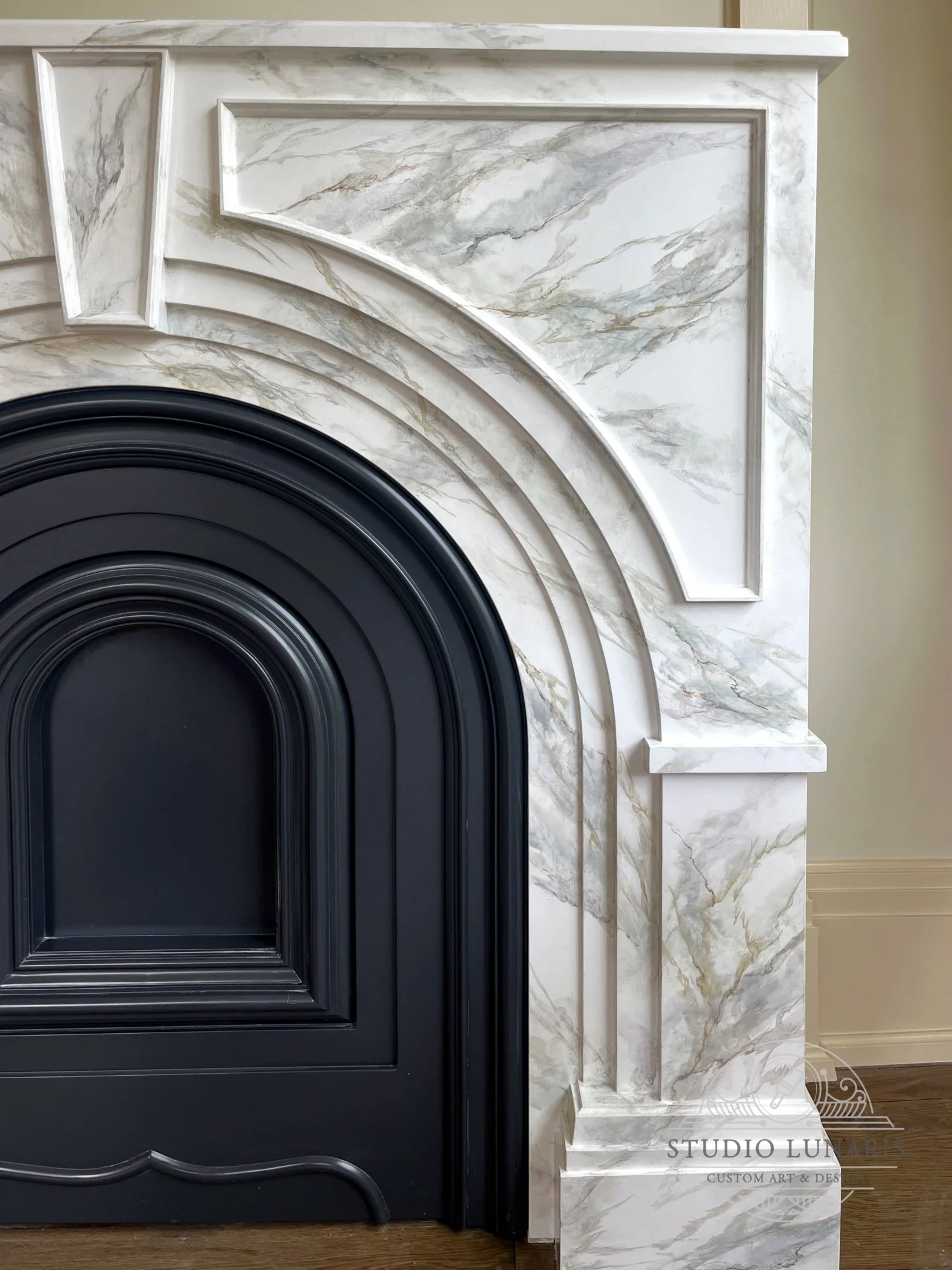 Faux painted gold calacatta marble fireplace 