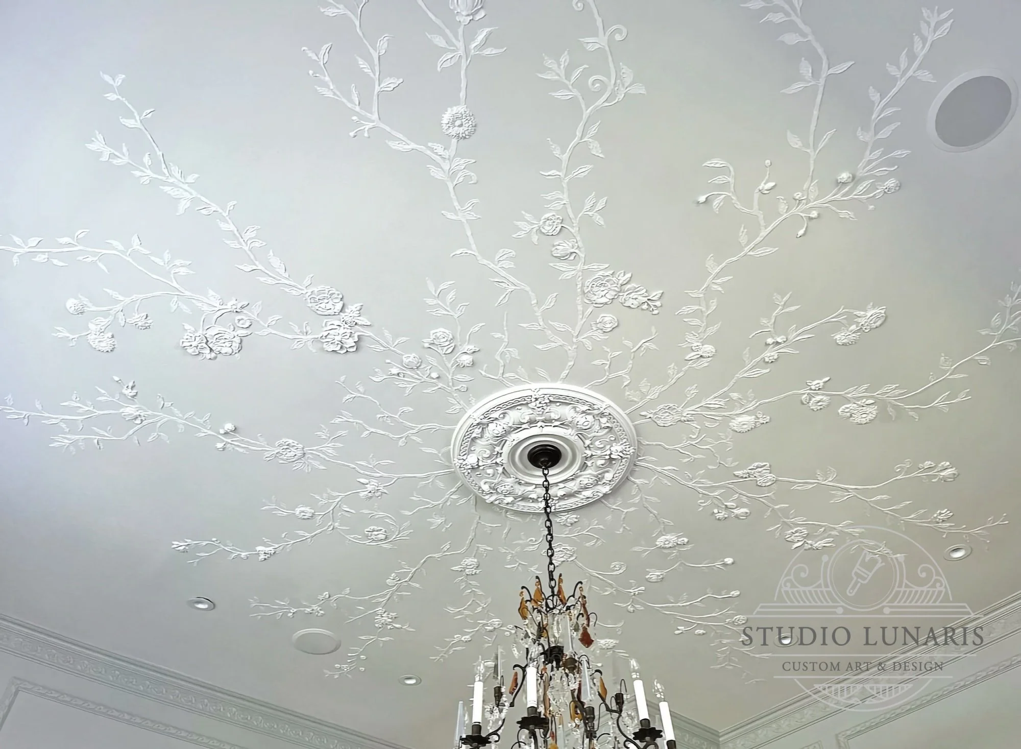 Dining room ceiling vine mural with decorative plaster, bas-relief branches and cast and hand-detailed floral elements
