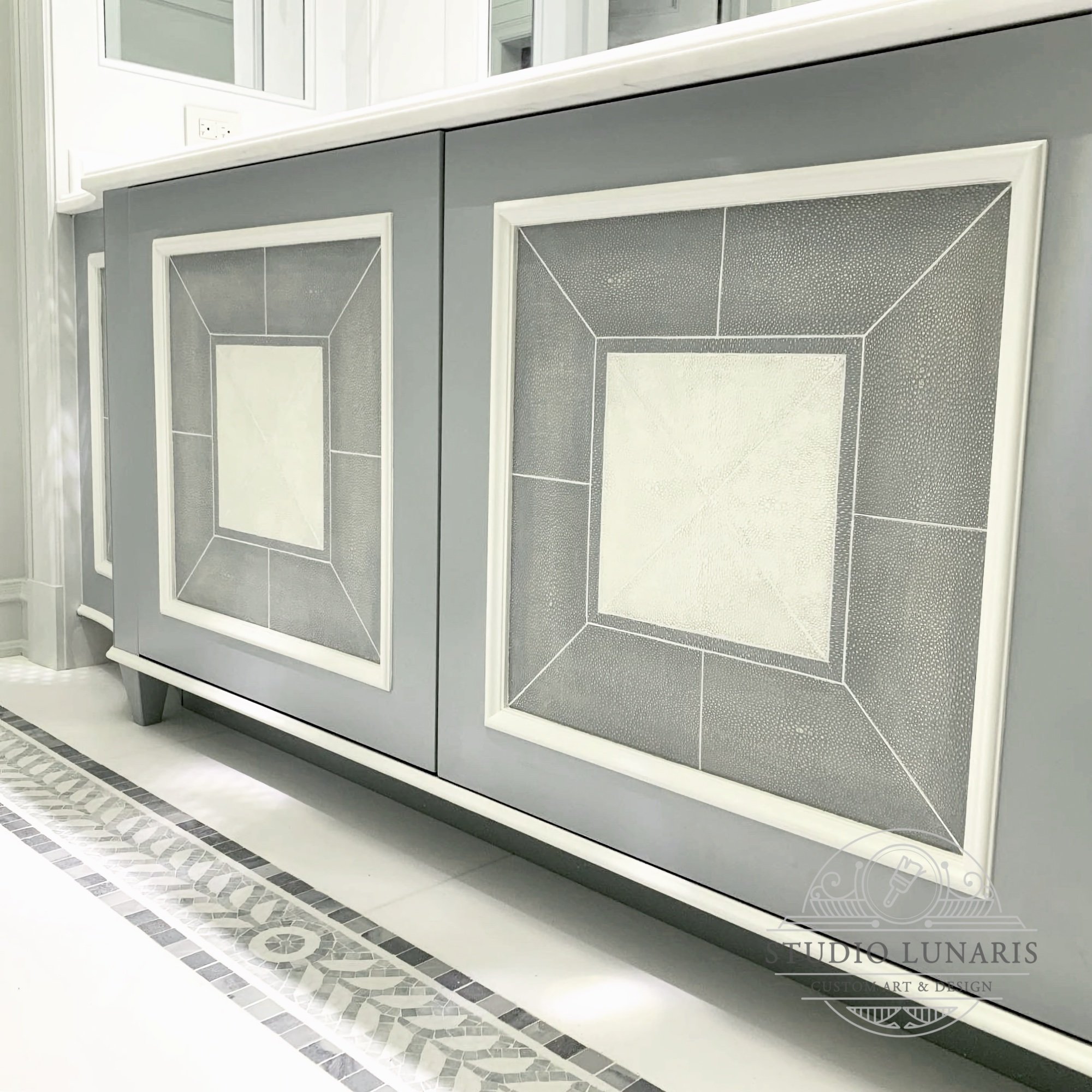 Bathroom vanity cabinet with faux shagreen texture on doors, close up