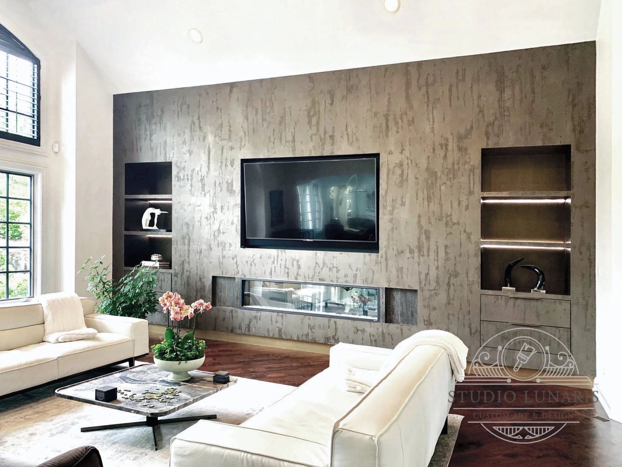 Living room accent wall with faux bark plaster texture 