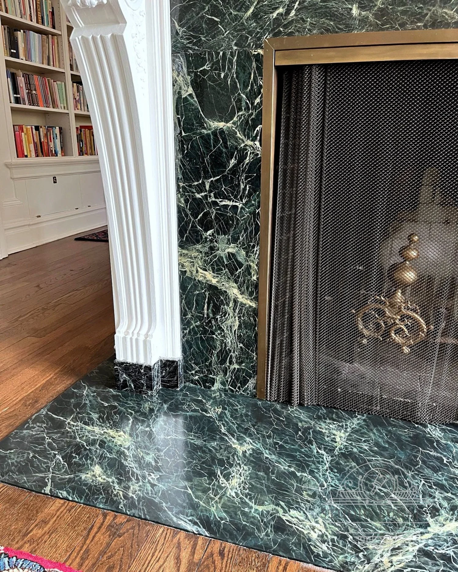 Hearth floor painted to match the Forest Green Indian marble fireplace 