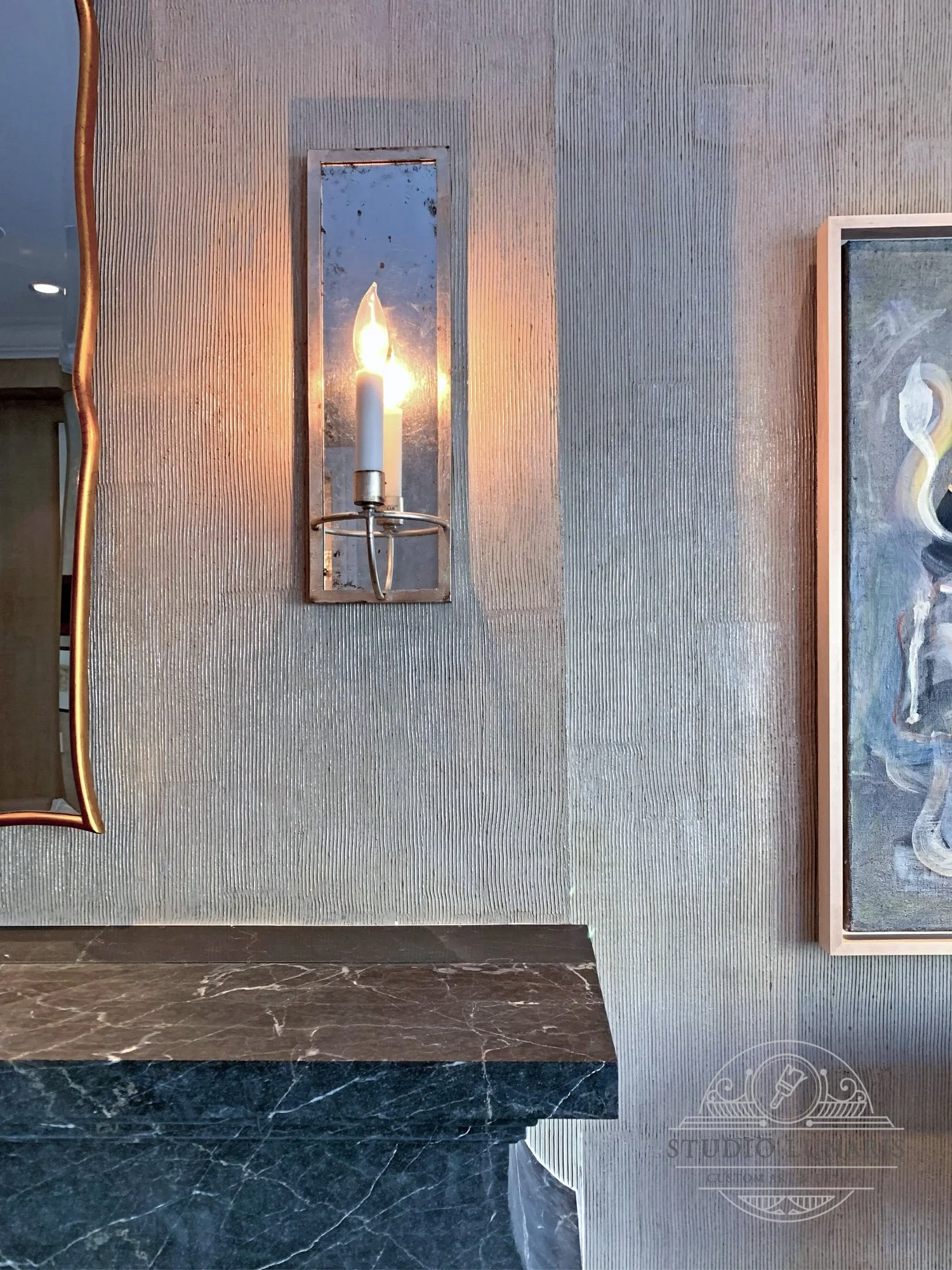 Piano room walls with a combed plaster texture and faux filigree metallic highlights