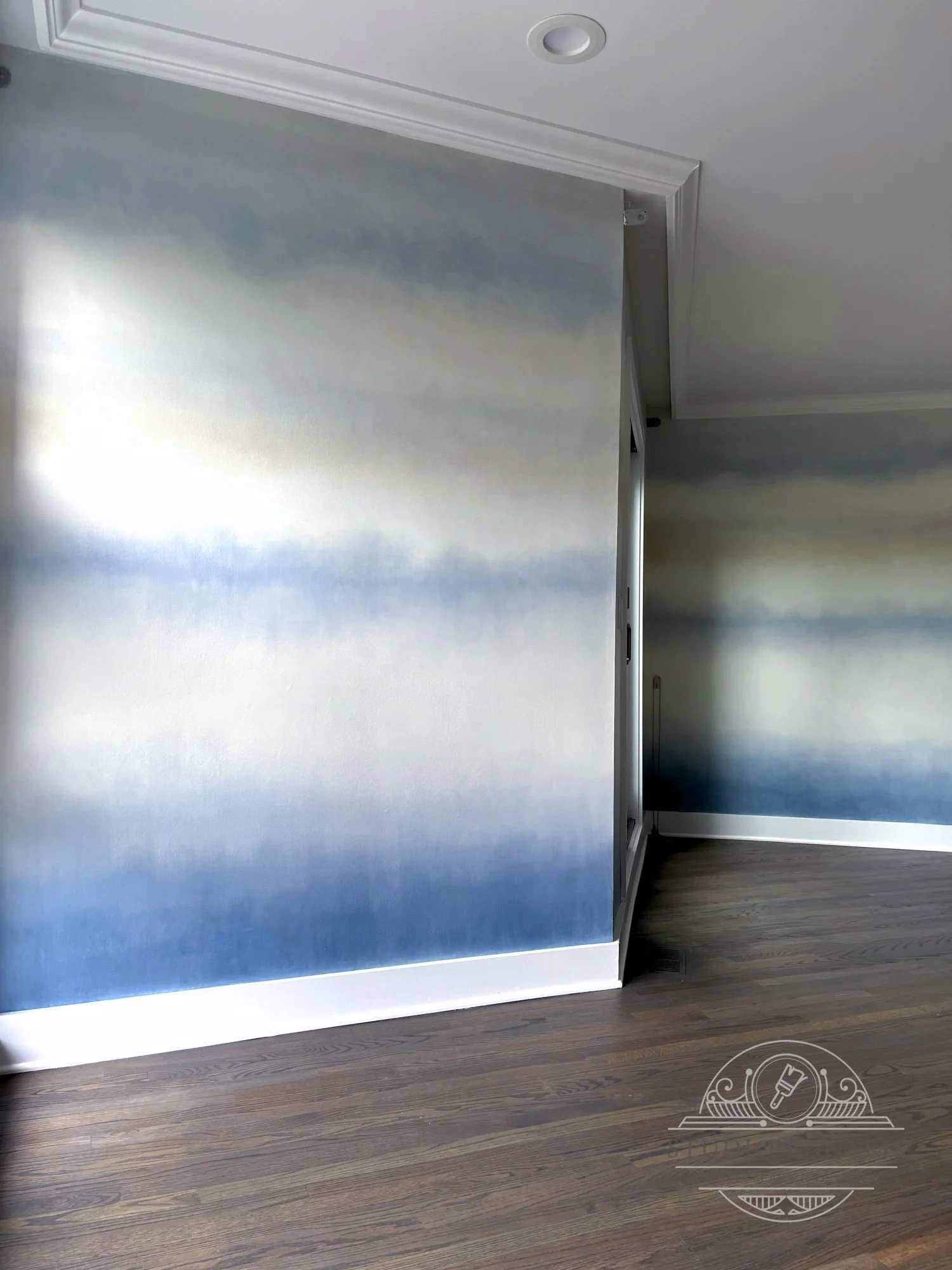 Bedroom finish with an organic, striated, soft blue, white and rust color palette