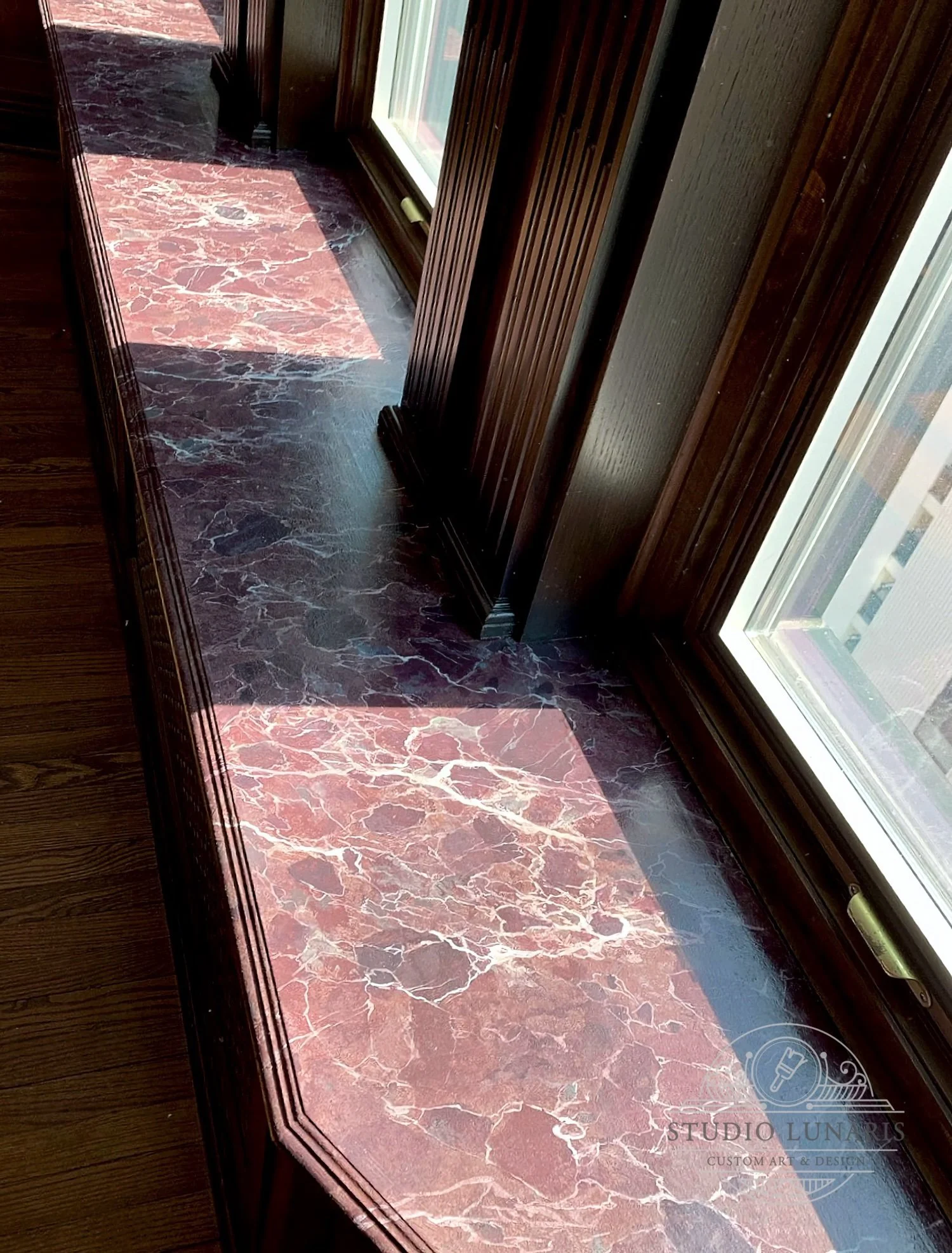 Painted window ledge to match the existing Rosso Levante marble fireplace 