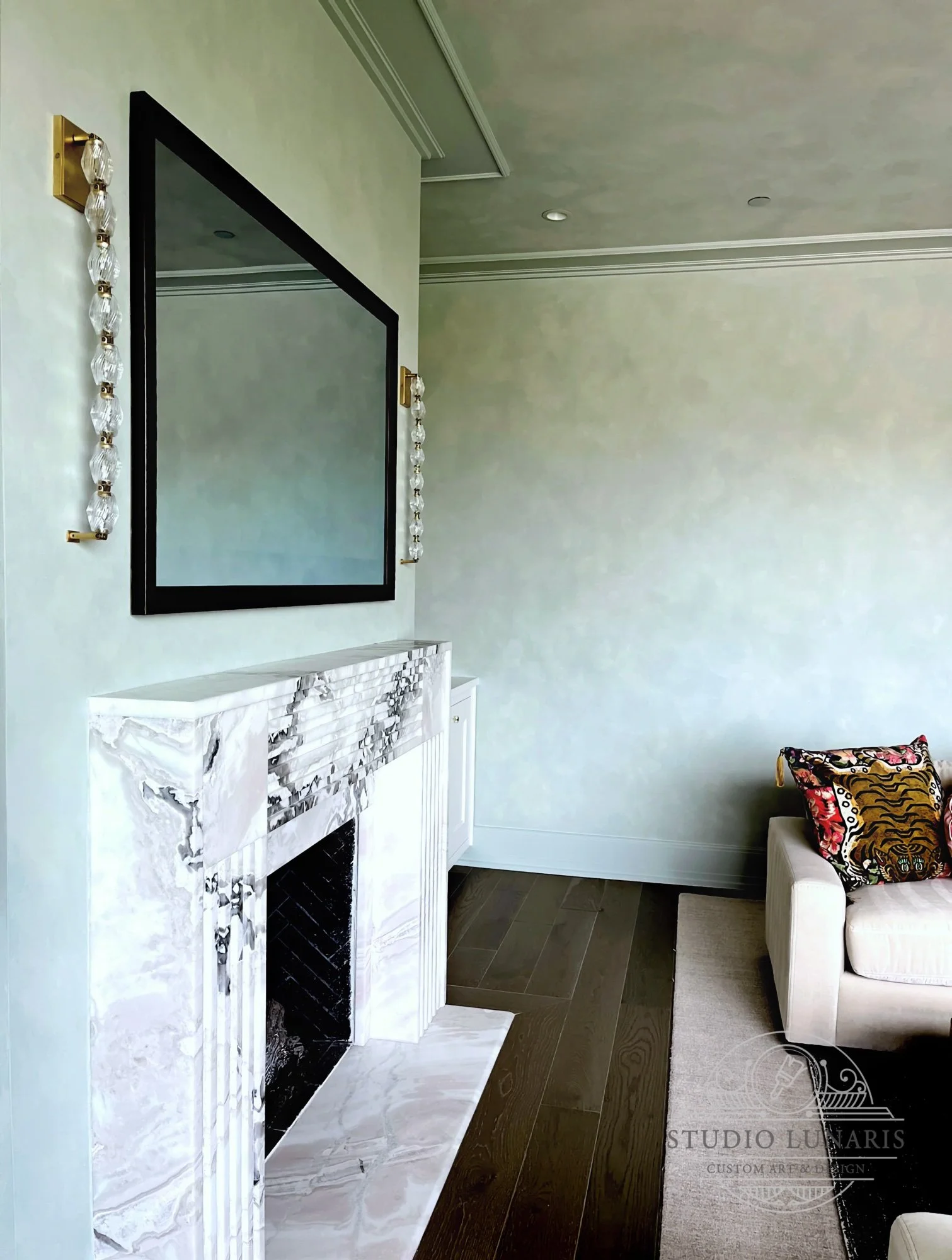 Living room limewash in soft, light green tones
