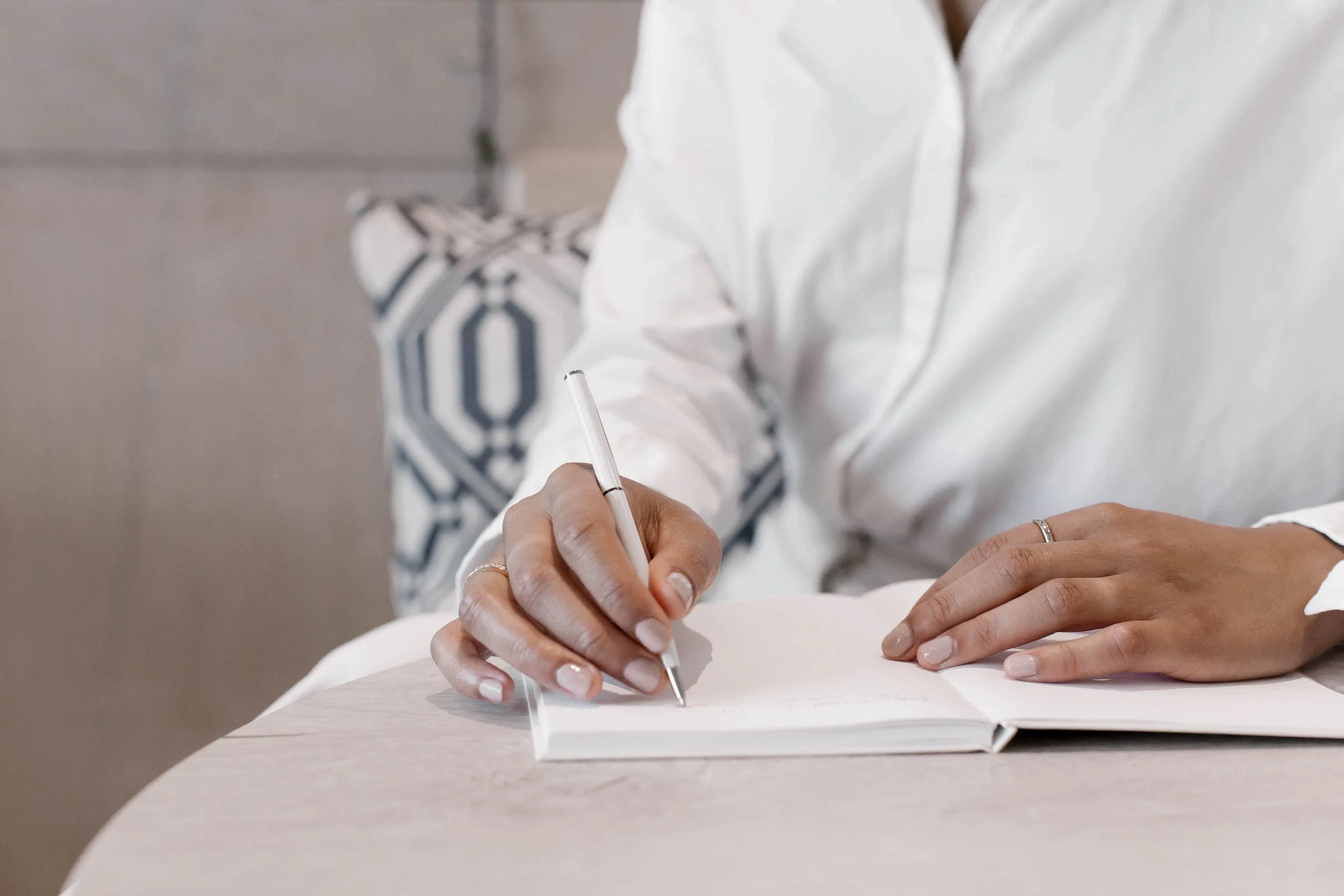 integrative medicine doctor writing in notebook