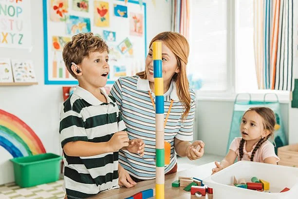 child playing during auditory verbal therapy at Little Ears, Big Voices in Orange County, CA