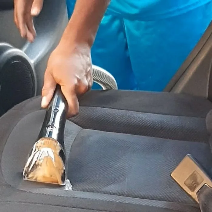 Professional mobile detailing in Maryland - hot water soil extraction on cloth car seats to remove deep-set stains and odors.