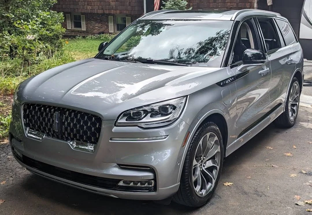 A silver Lincoln Aviator SUV showing amazing high-gloss results after a professional ceramic coating and mobile detailing service in Harford County, Maryland.
