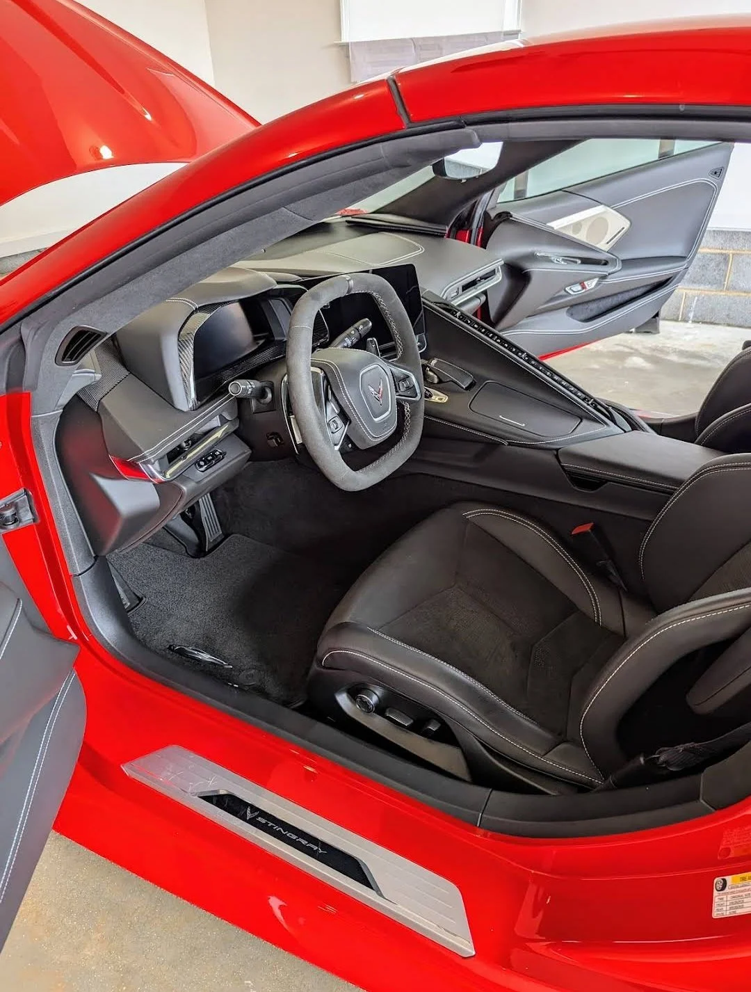 High-Performance Interior Restoration. This Corvette Stingray received a comprehensive deep-clean focusing on its specialized Alcantara and leather surfaces. Our signature 4-hour interior process ensures that every detail--from the driver-centric coc