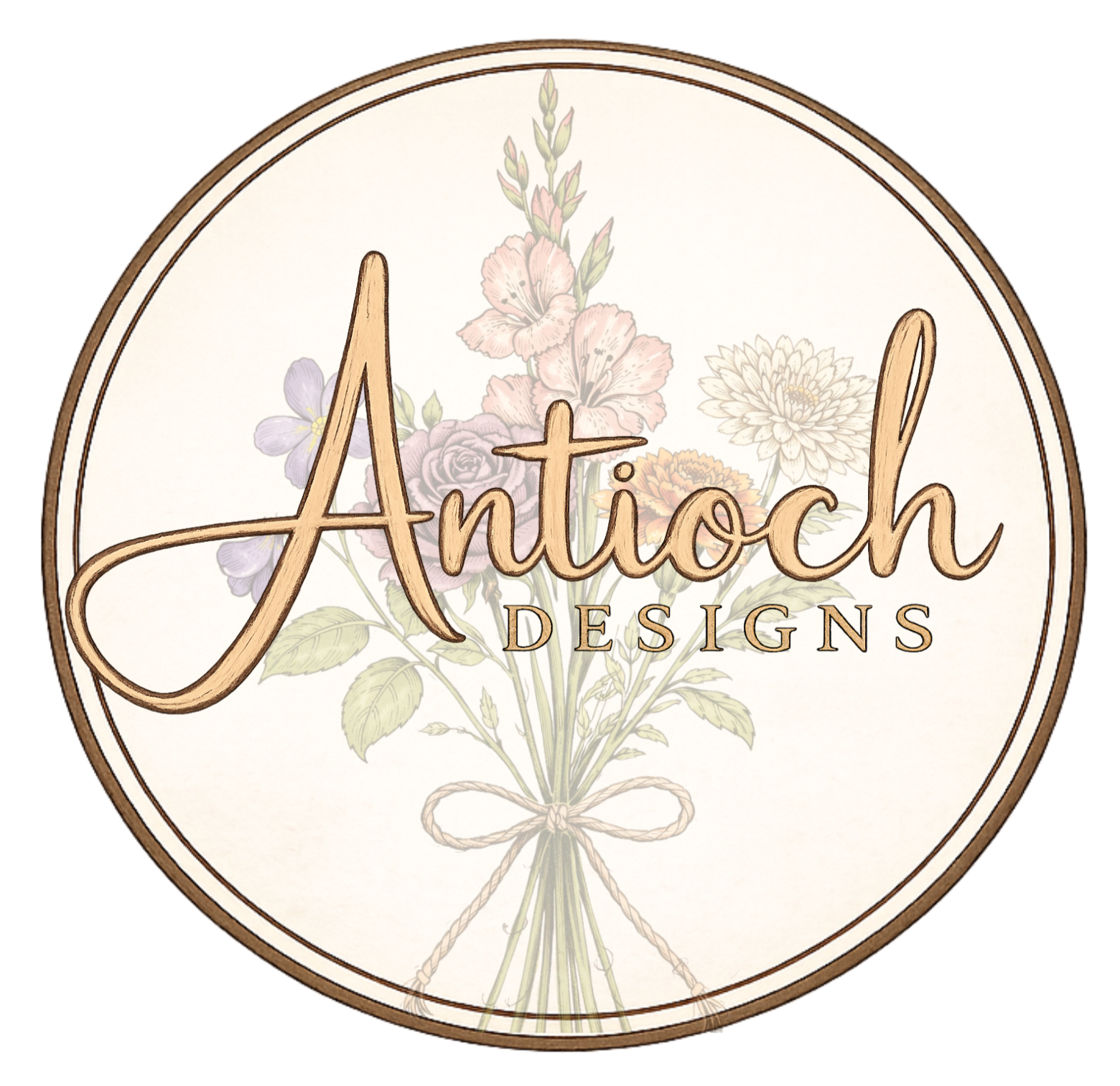 A circular logo with a background of a floral illustration with pink, purple, and orange flowers, and green leaves. The words "Antioch Designs" are written in a cursive, wooden-style font across the center.