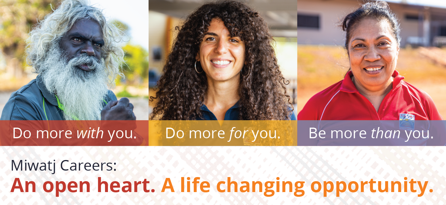 Three diverse people smiling: an elderly Indigenous man with a gray beard and long gray hair, a young woman with curly hair, and a middle-aged woman with dark hair tied back. They are outdoors and looking at the camera.