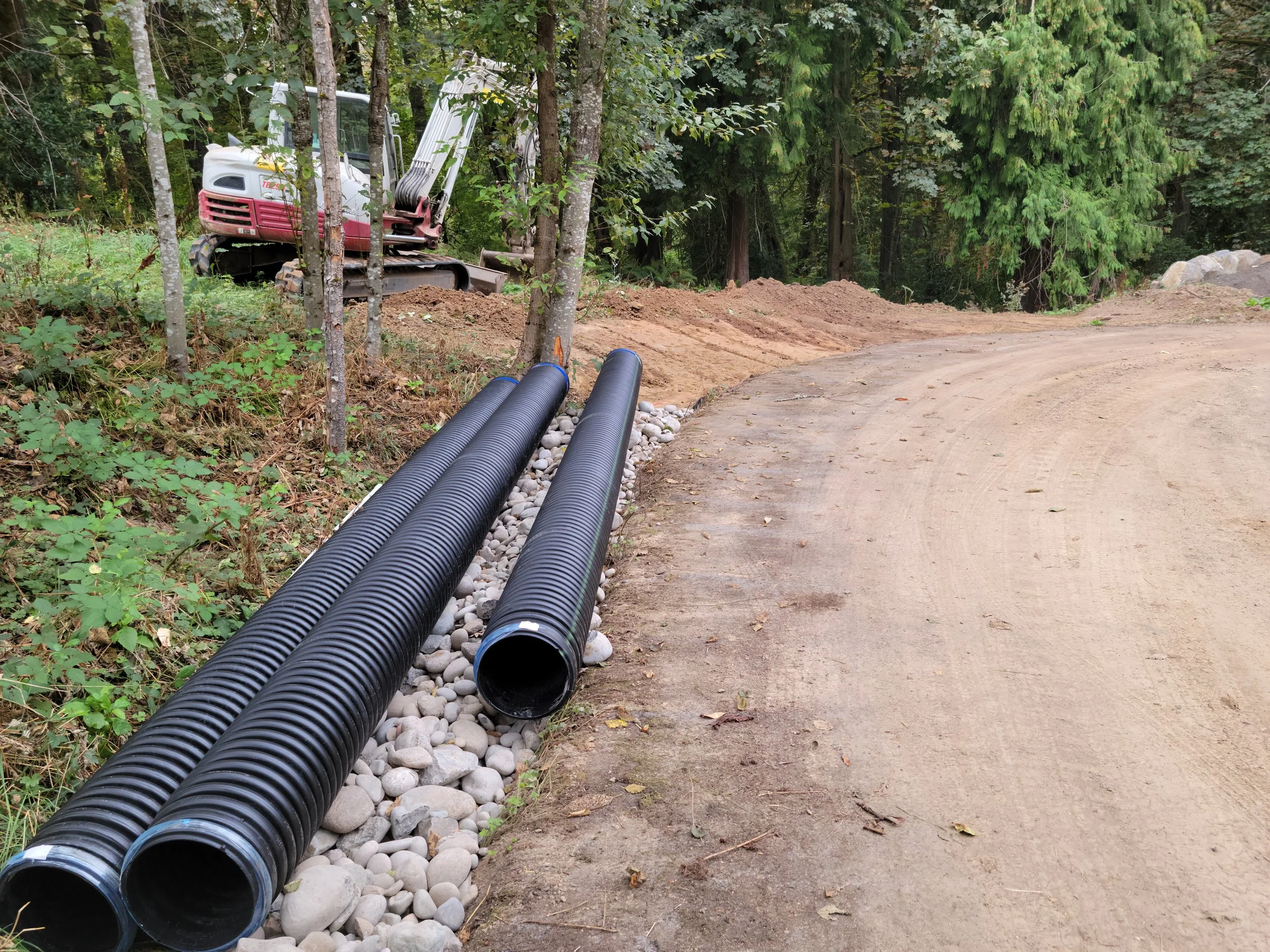culverts ready to install along road