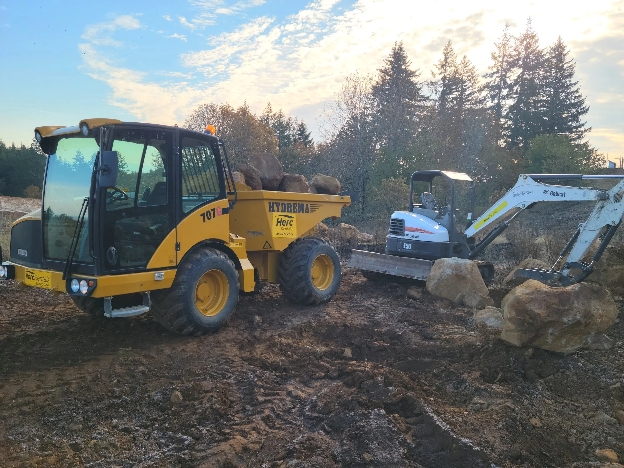 Hauling boulders for retaining wall. West Salem