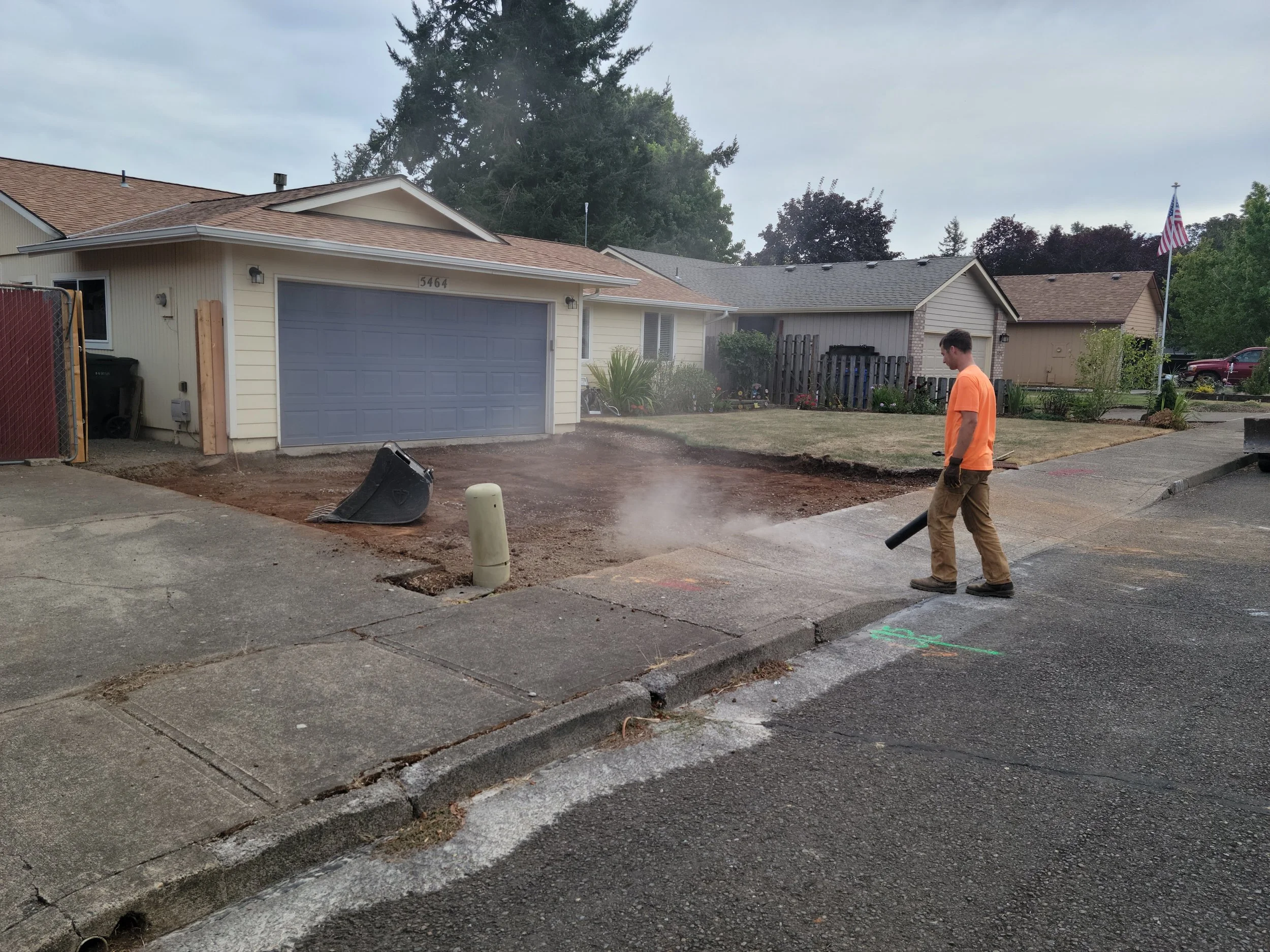 Cleaning after removing the concrete from a driveway replacement job in Salem Oregon.