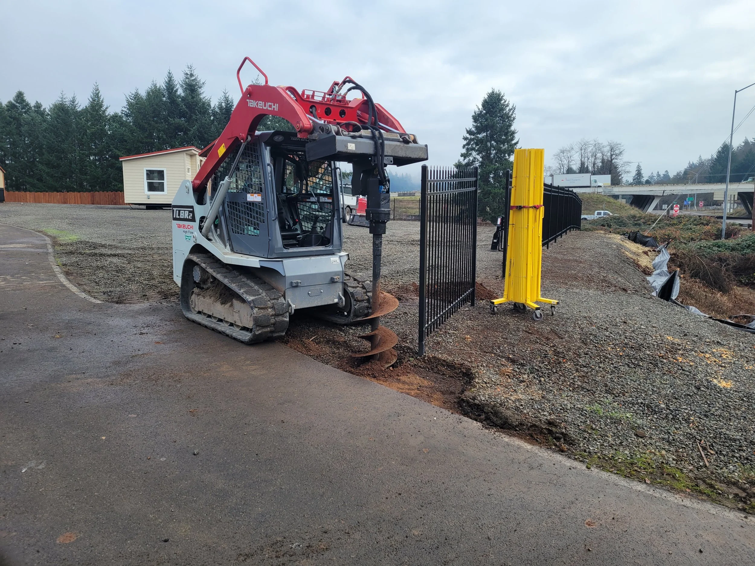 Drilling for post hole for a new gate Salem Oregon.