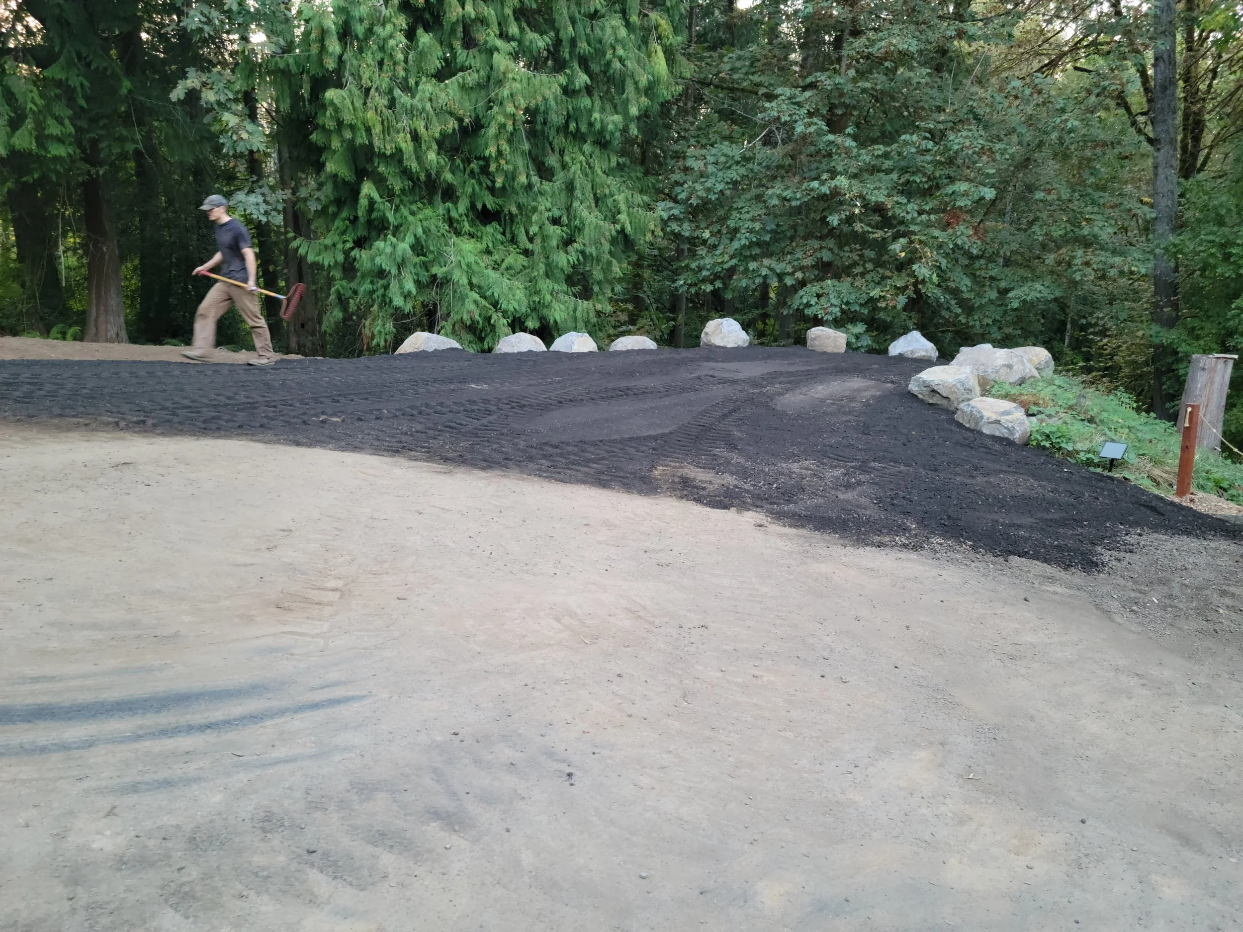 bordered parking lot with boulders 