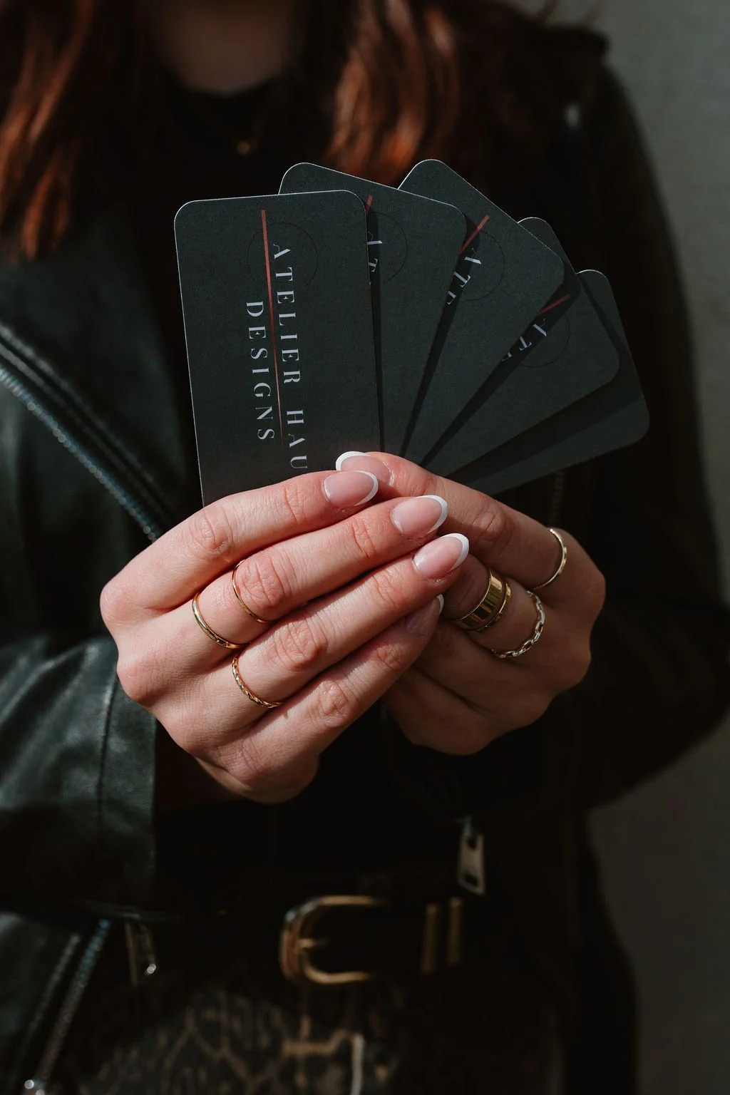 Atelier Haus business cards up close, designed by April, owner in Westminster, MD, showcasing creative web design services in Carroll County