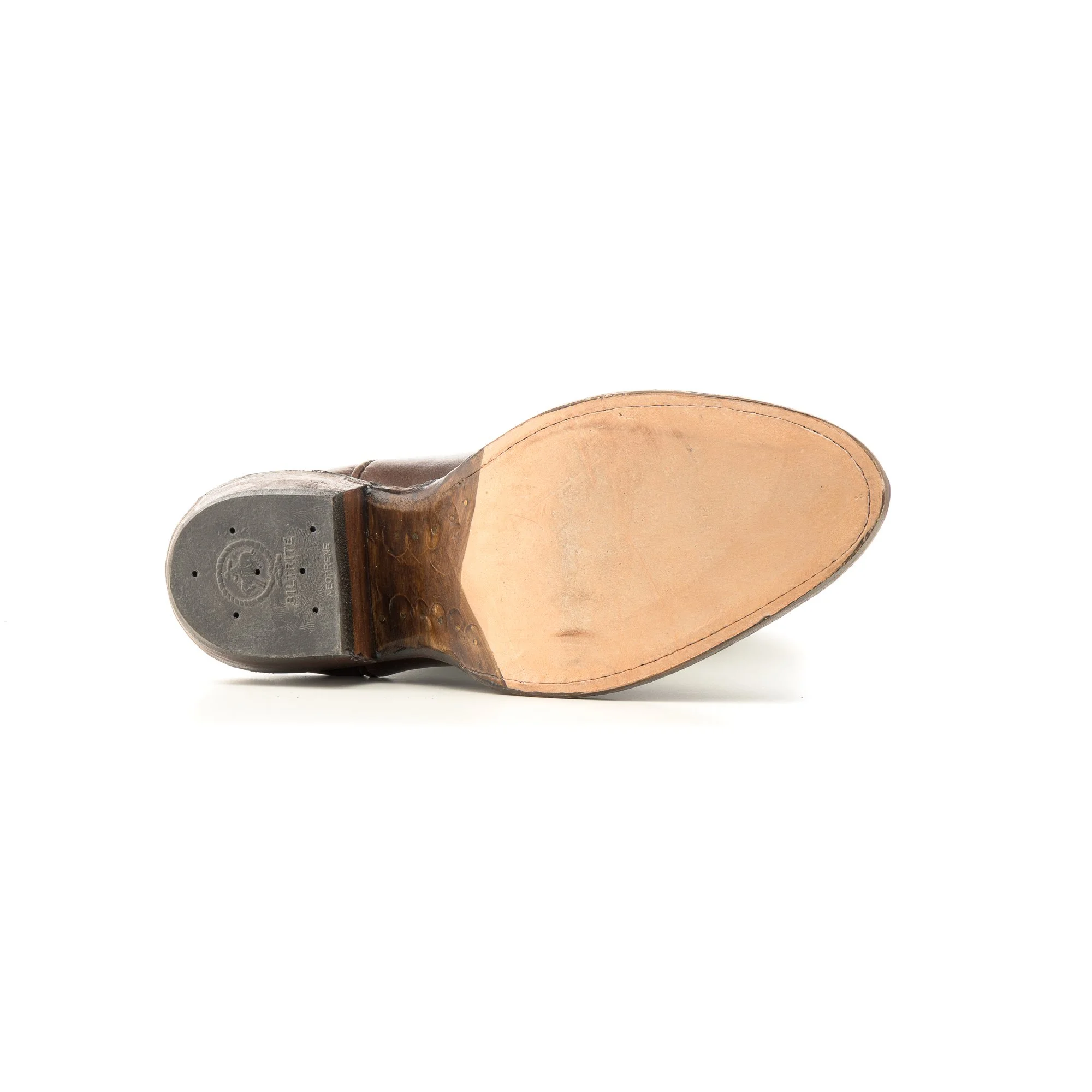 Close-up of the bottom sole of a brown leather dress shoe with a wooden heel, isolated on white background.