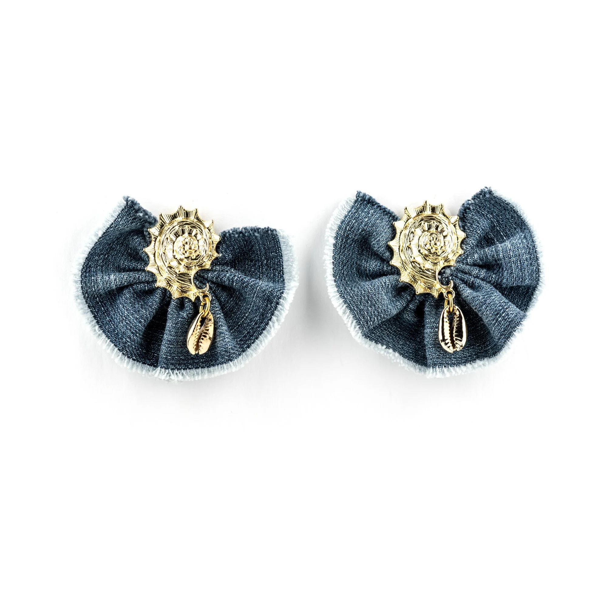 Pair of jean fabric earrings with gold-colored sun and leaf charms hanging from the center.