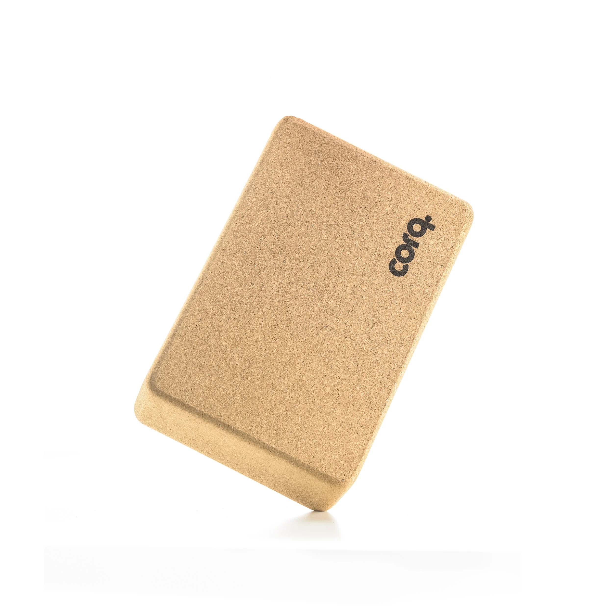 A beige cosmetic sponge with the brand name 'conq' printed on it, isolated on a white background.