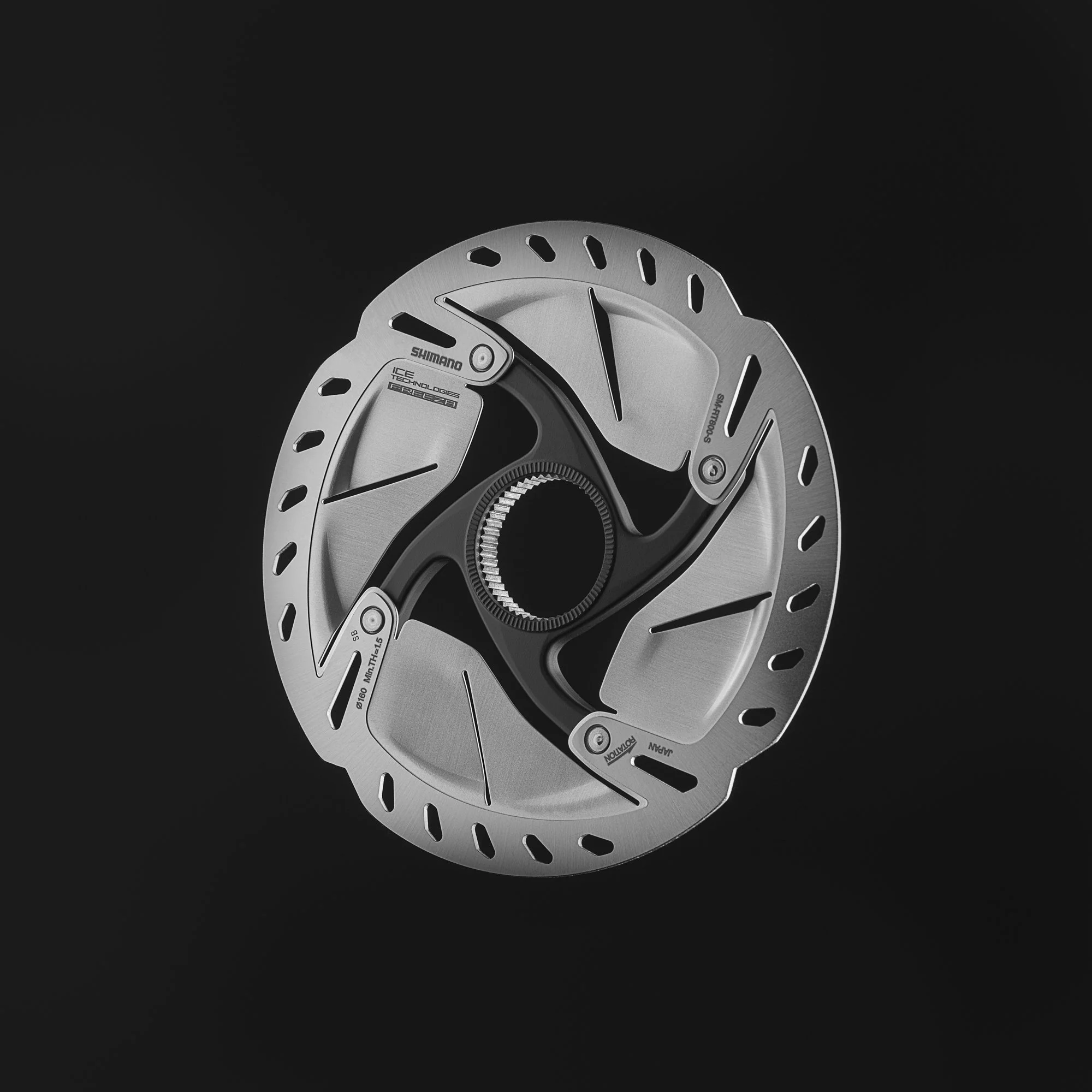 A sleek, modern bicycle disc brake rotor with a black center and silver braking surface, isolated on a black background.