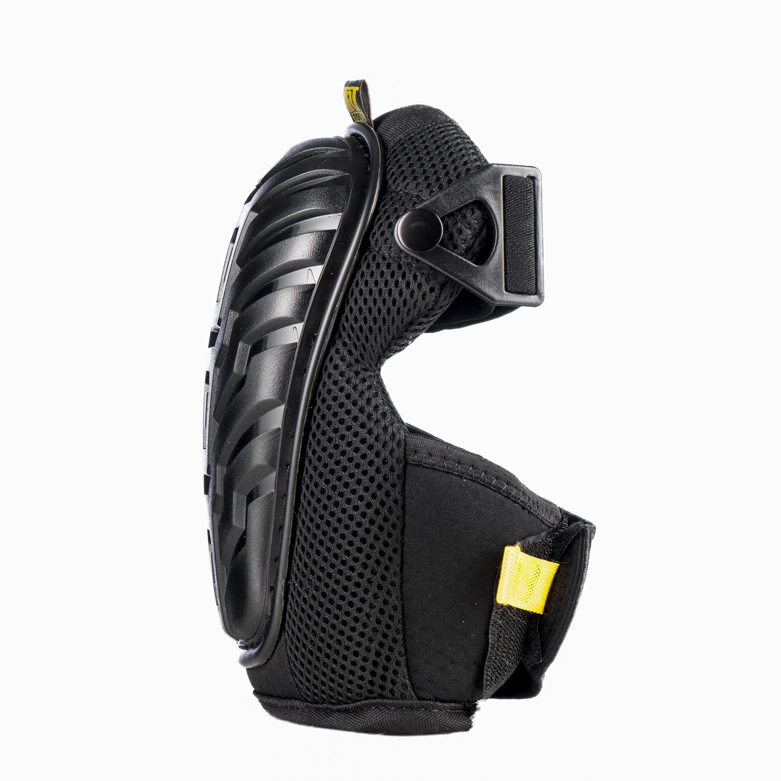 Close-up of a black cycling helmet with mesh padding and yellow strap detail.