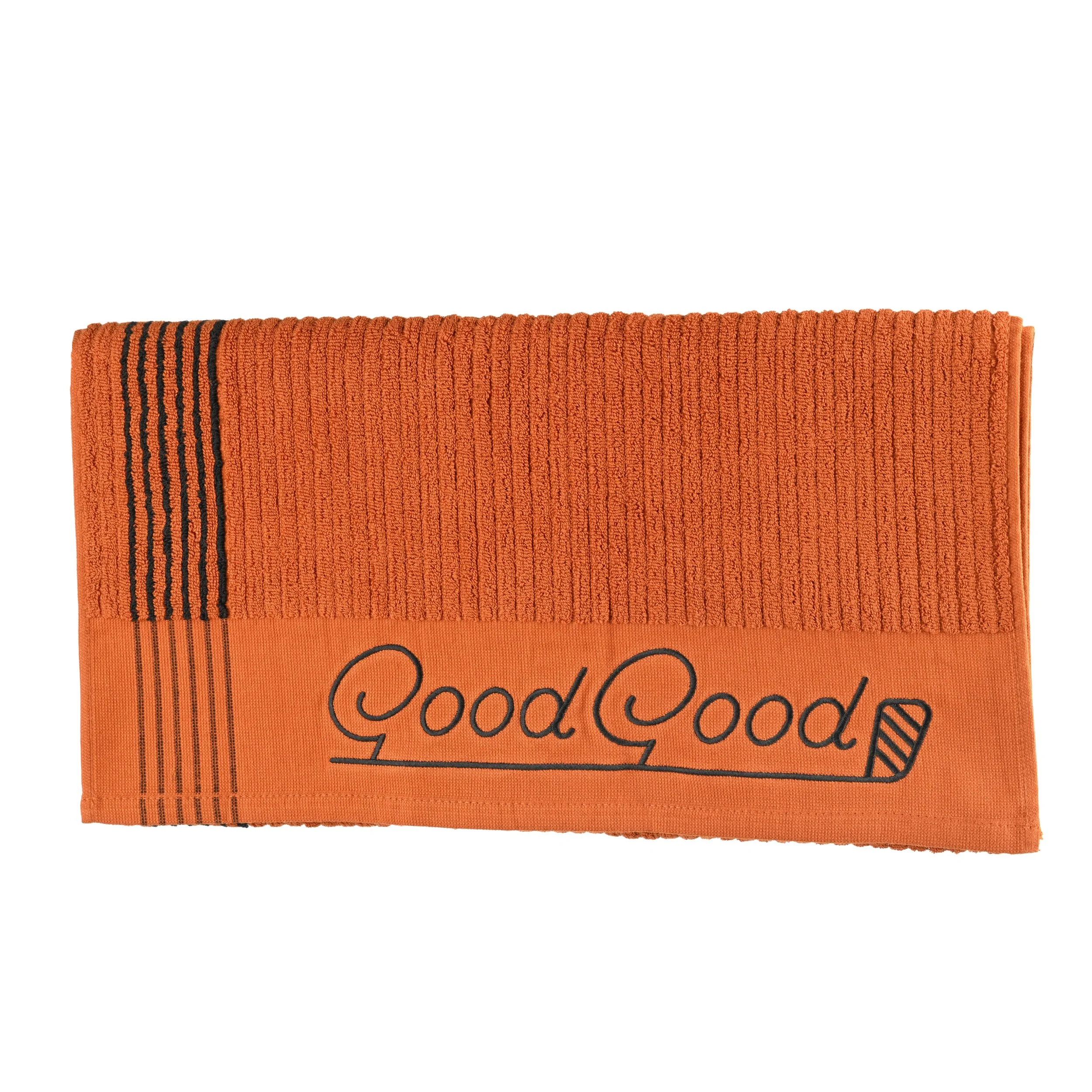 Orange towel with black stripes and the words 'Good Good' embroidered on it.