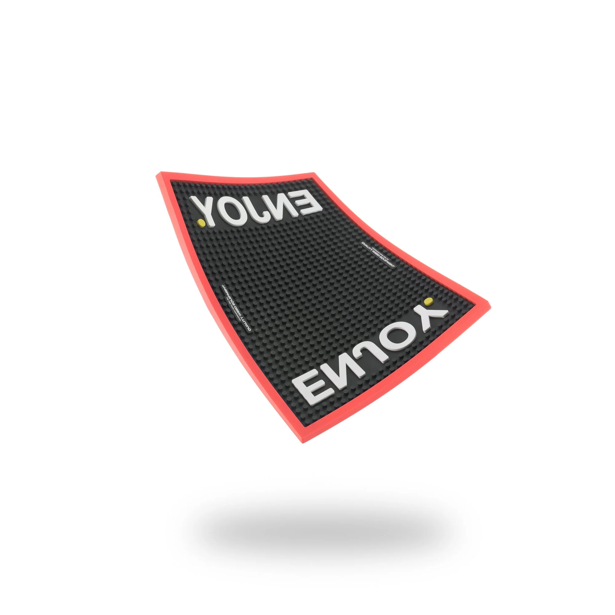 A rubber floor mat with the word "YOUNG" written in large white letters, surrounded by a red border and featuring two small yellow dots.